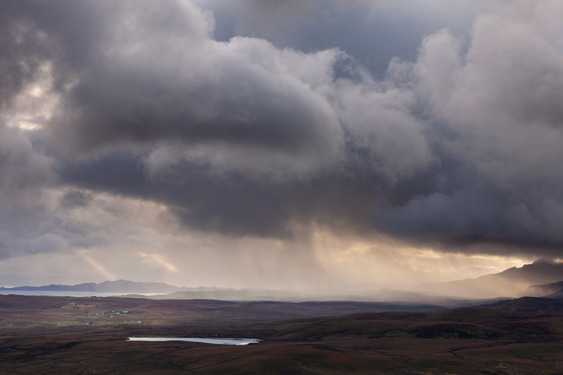 A storm over the plains below the Quiraing, Isle of Skye, Scotland.