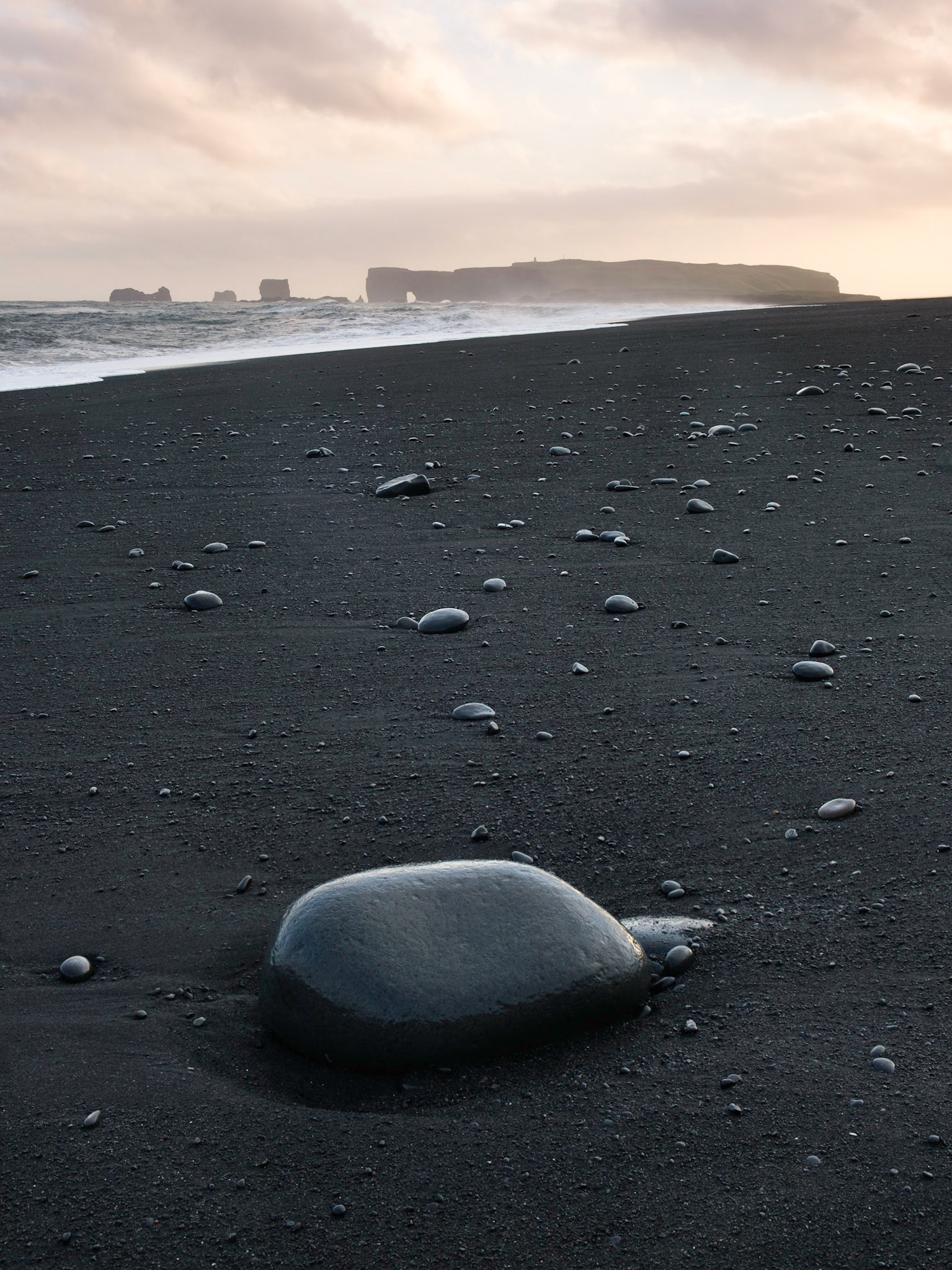 We stayed in a small hut right on Reynisfjara Beach. When we arrived the parking lot was full and the beach crowded but by 9pm I had the entire beach to myself.
