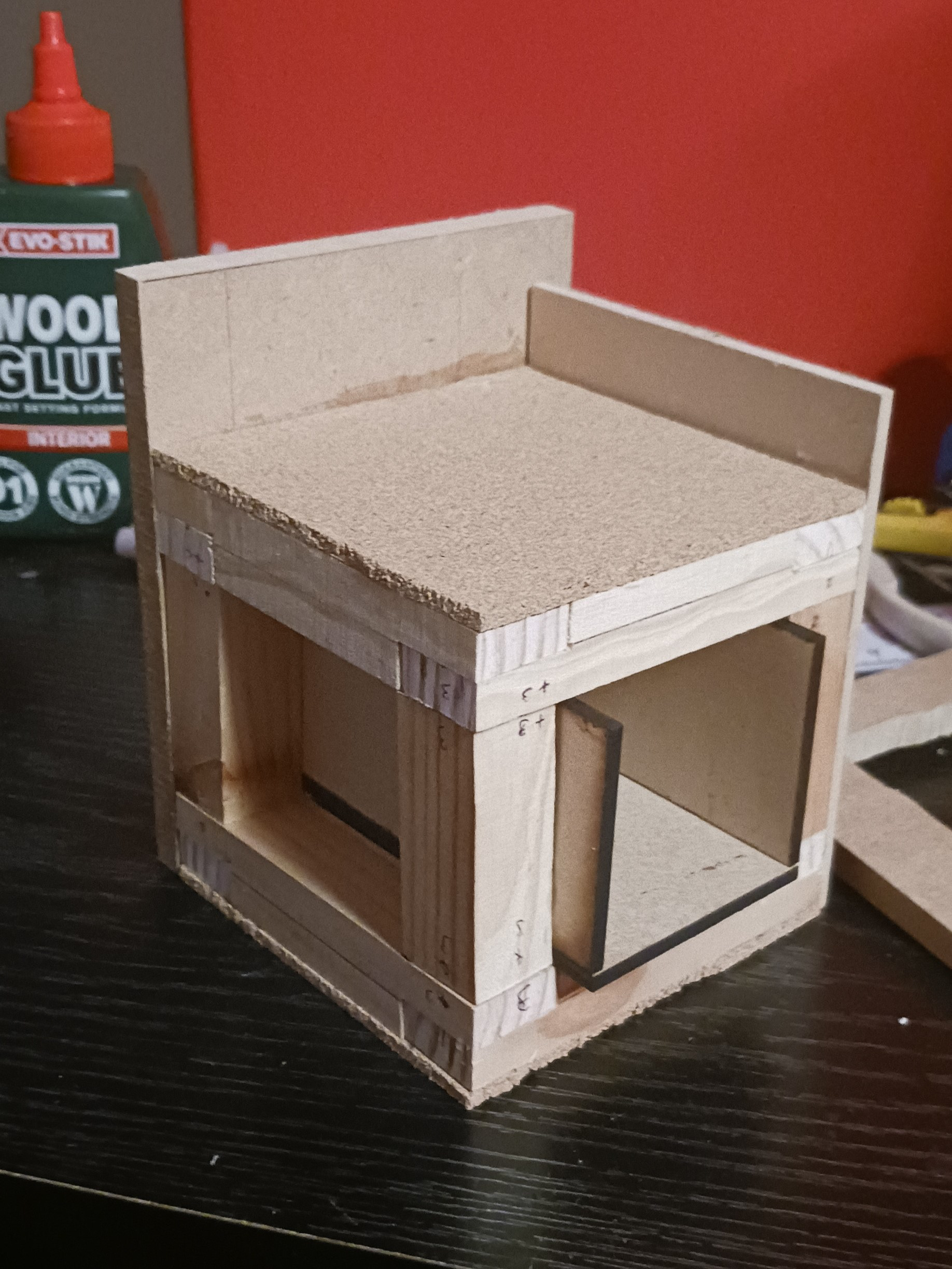 Assembly of sides, back, and storage.