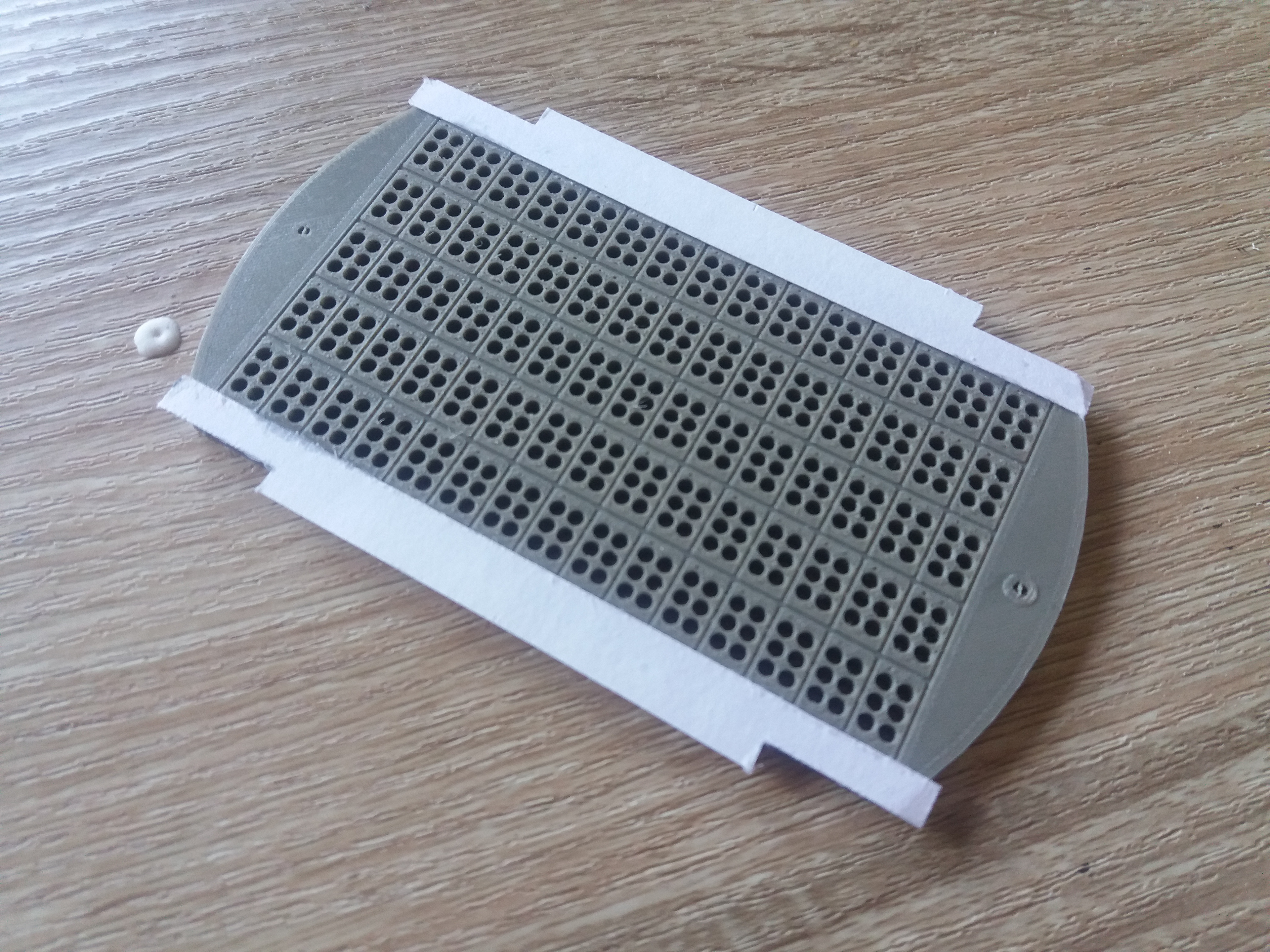 Braille pad had to be attached with glued card.