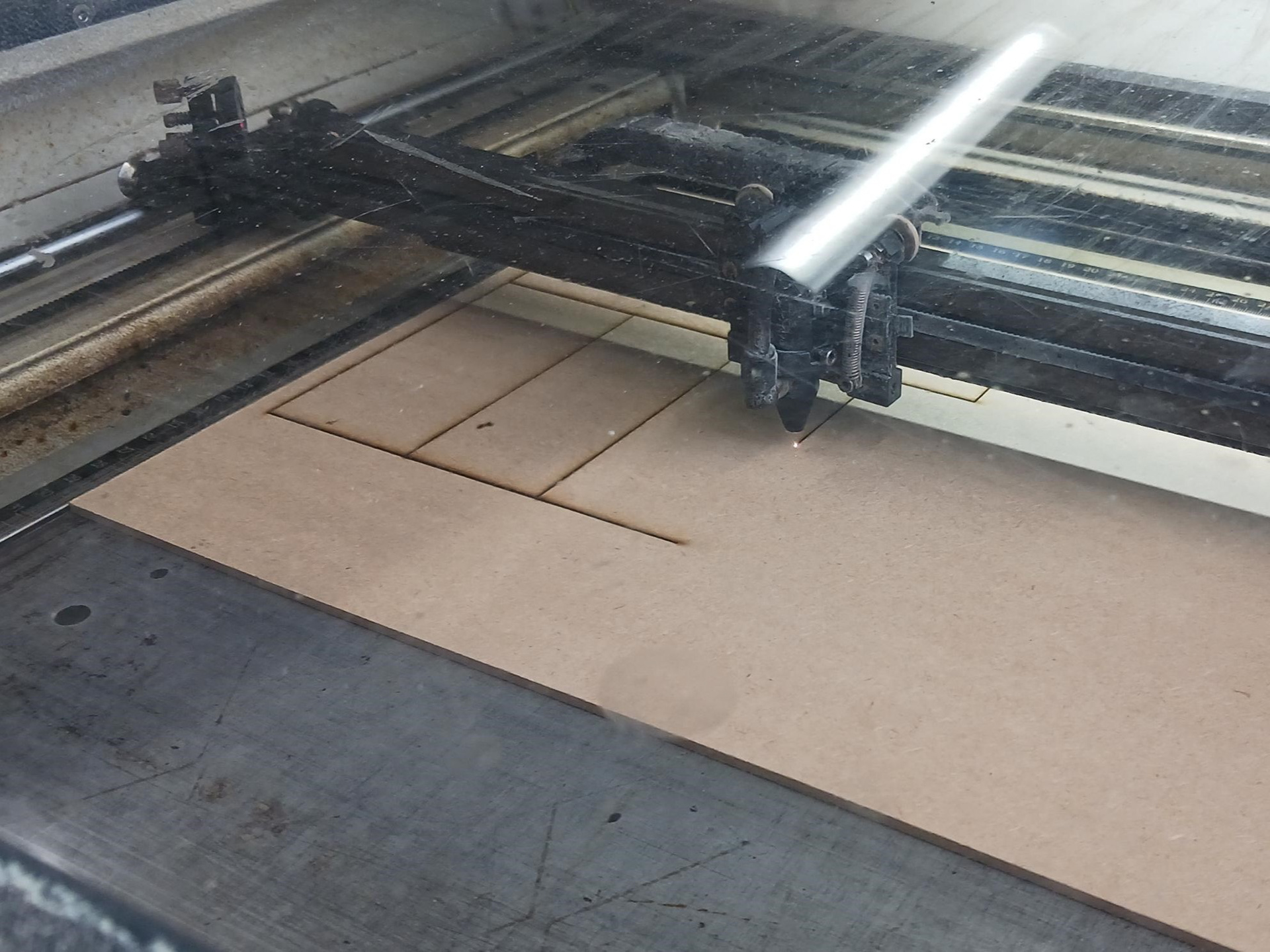Lasercutting panels.