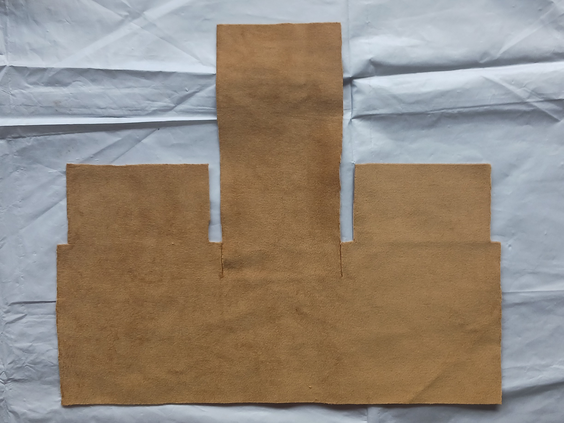 Cutting out fabric.