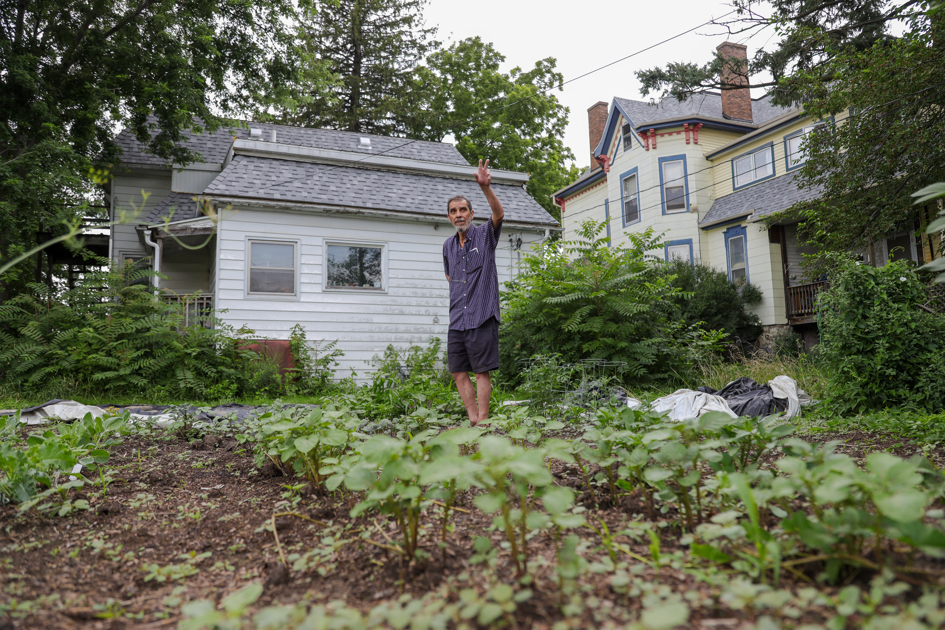 Kamal at the Garden Behind his house in Grinnell, Iowa