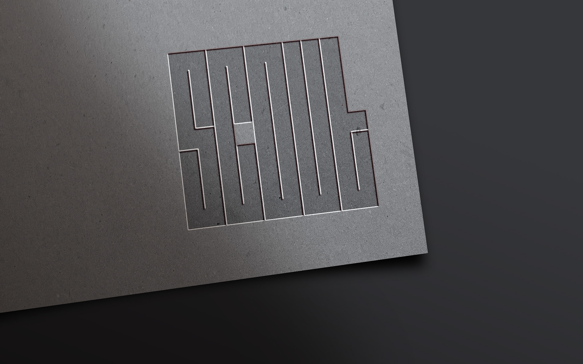 Scout logo deboss on cardboard