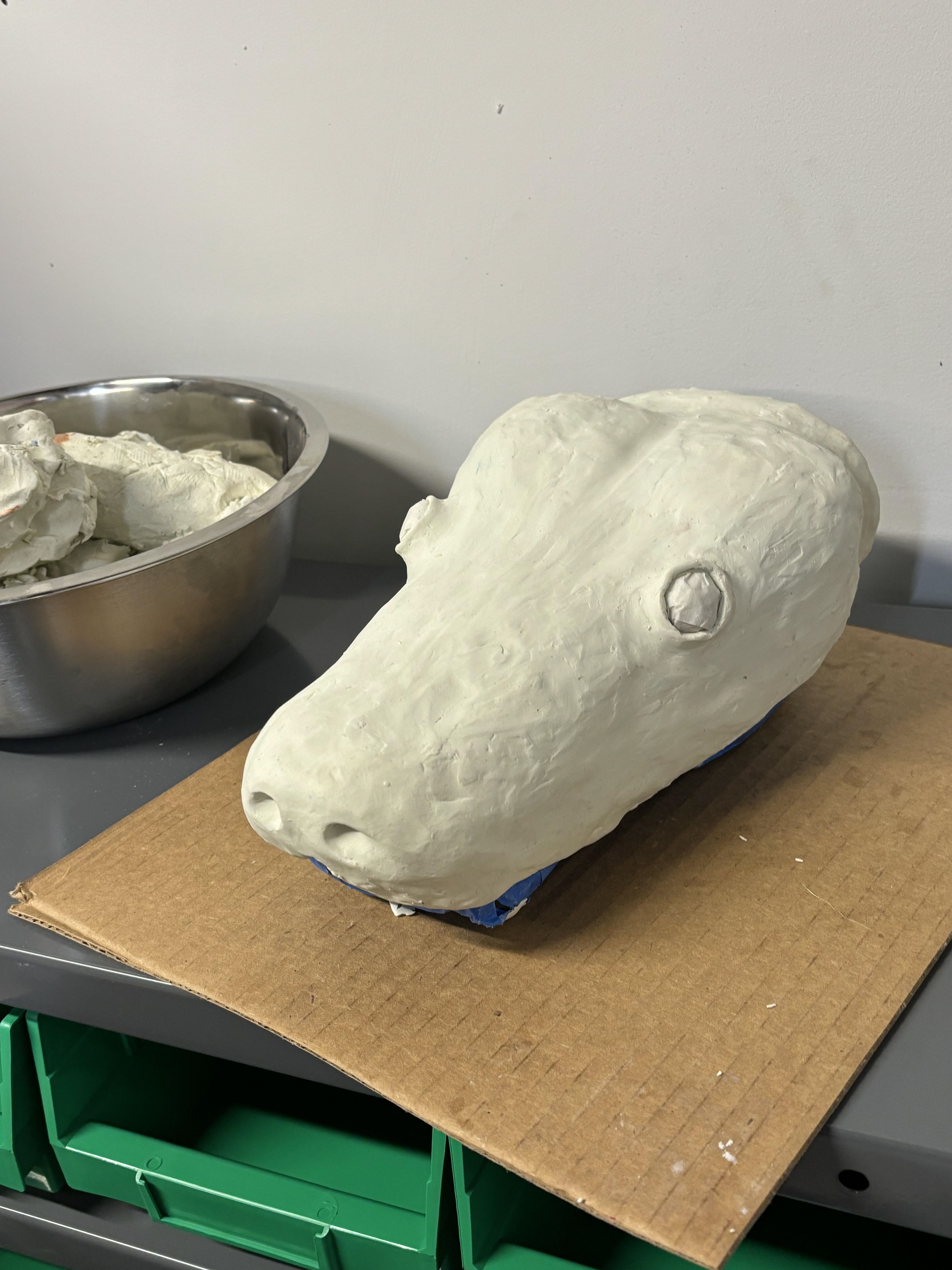 Head sculpted from clay & then paper casted