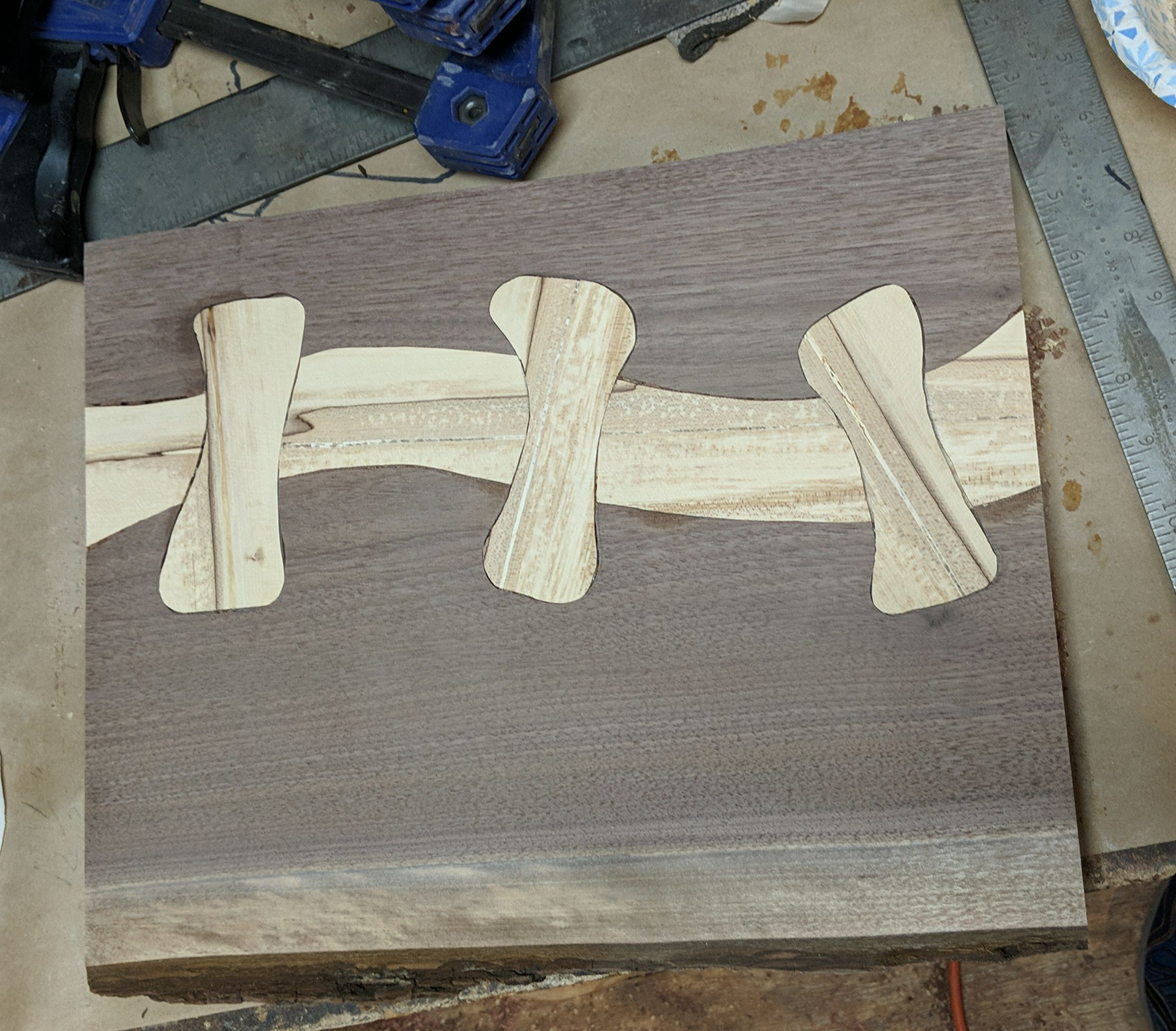 Hand-routed underside inlays