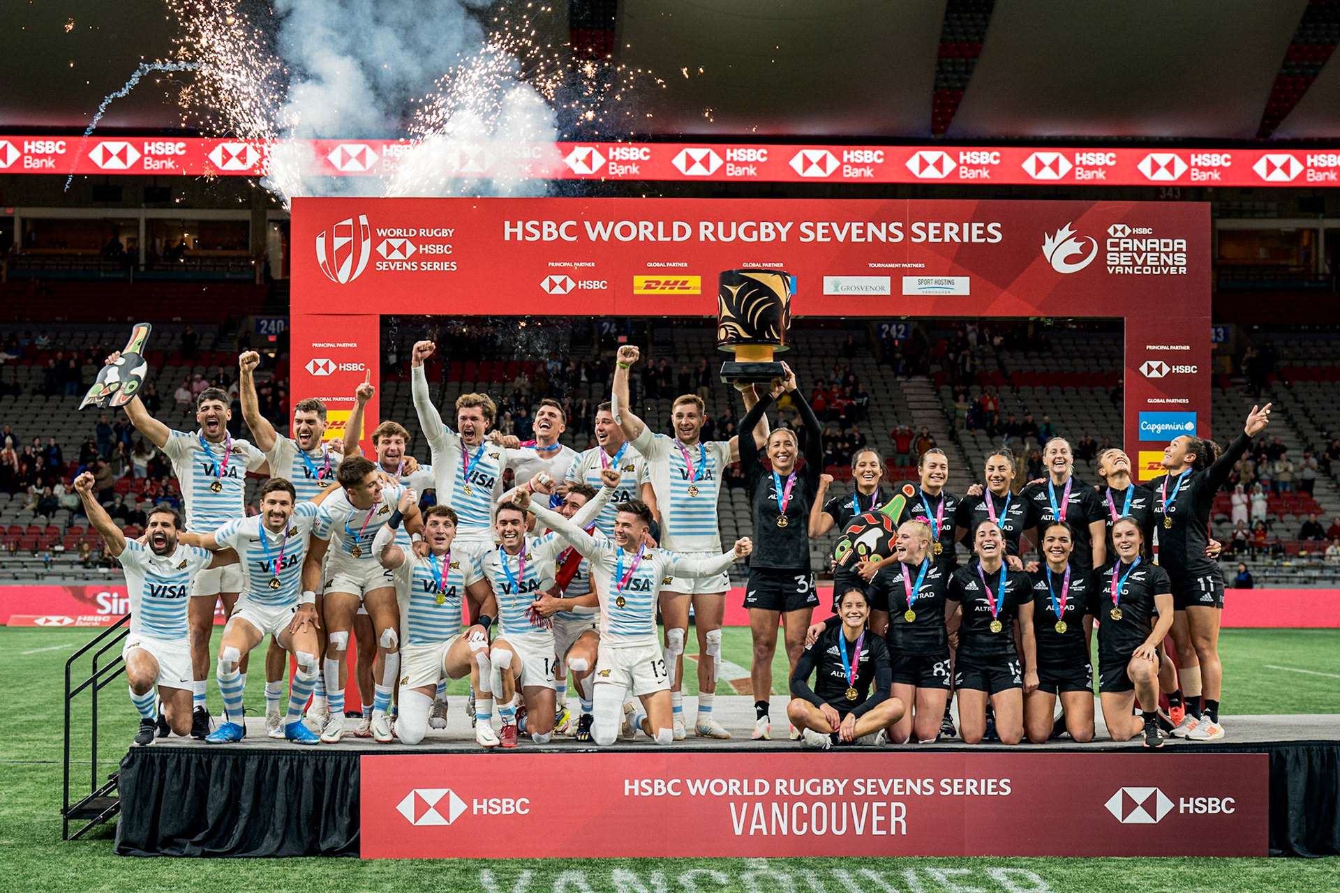 Vancouver, Canada. 5th March, 2023. Mens Gold medallists Argentina's players (L) and Womens Gold medallists New Zealand's players (R) pose on the podium during the annual HSBC World Rugby Sevens Series tournament at BC Place in Vancouver, Canada. Credit: Joe Ng/Alamy Live News.