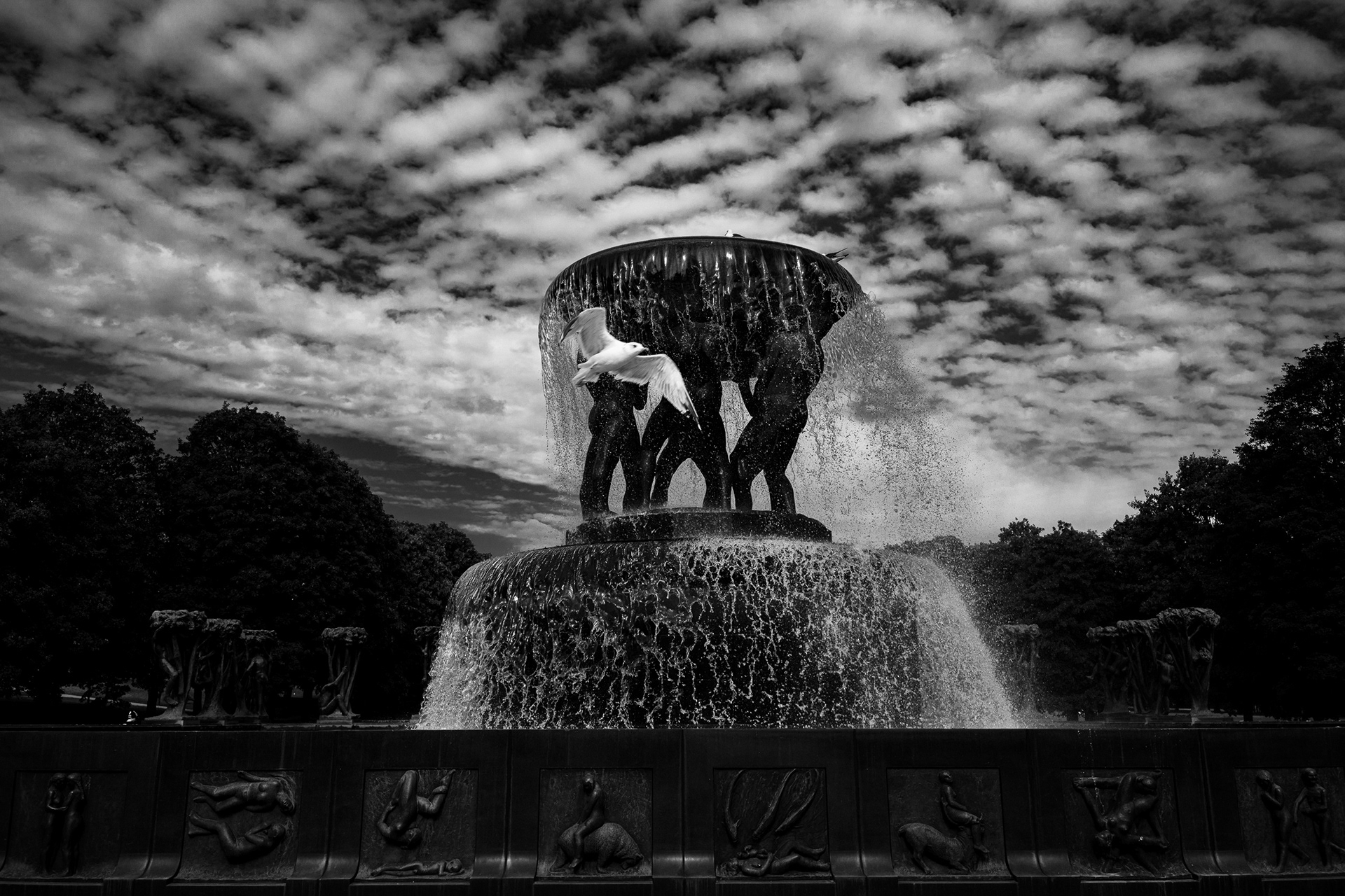 A dramatic 61MP black and white landscape of the Vigeland Fountain, captured on a Sony A7CR with Voigtlander 28mm glass and Leica Red Filter emulation.