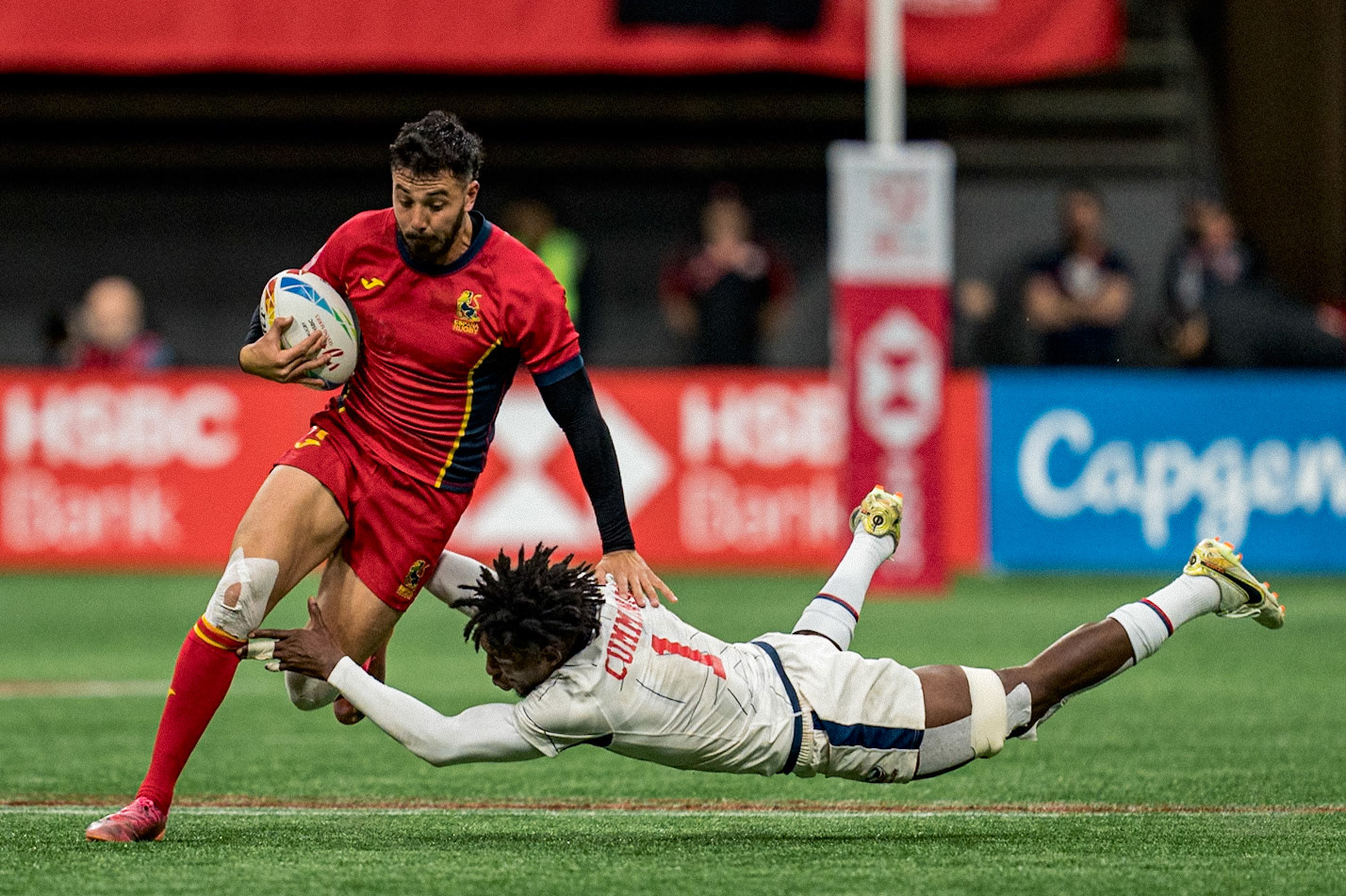 Vancouver, Canada. 4th March, 2023. Tiago Romero (L) of Spain fends off the tackle during HSBC Canada Sevens against USA at BC Place. Credit: Joe Ng/Alamy Live News.