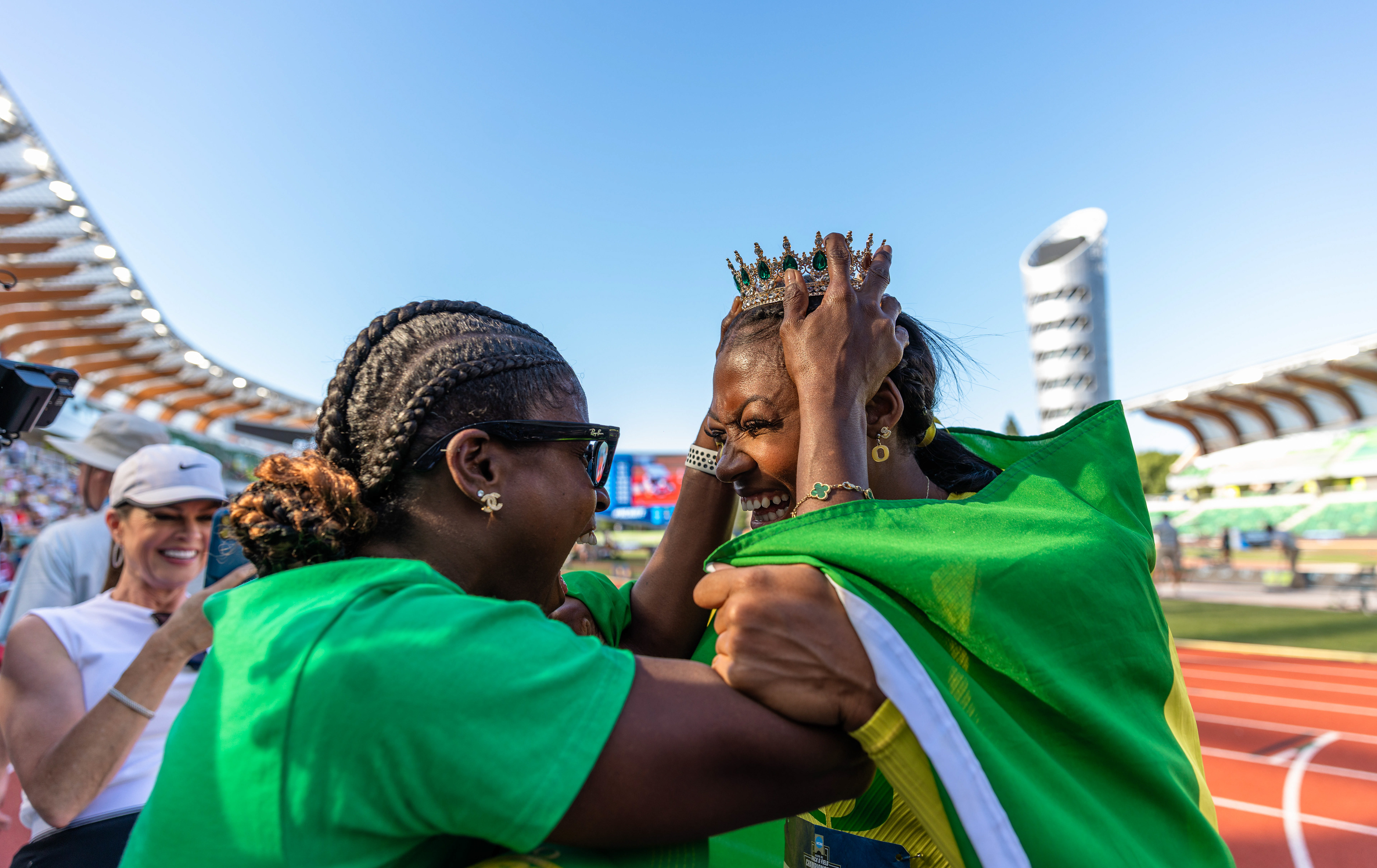 Aaliyah McCormick celebrates a 3rd consecutive National Title in the 100m Hurdles