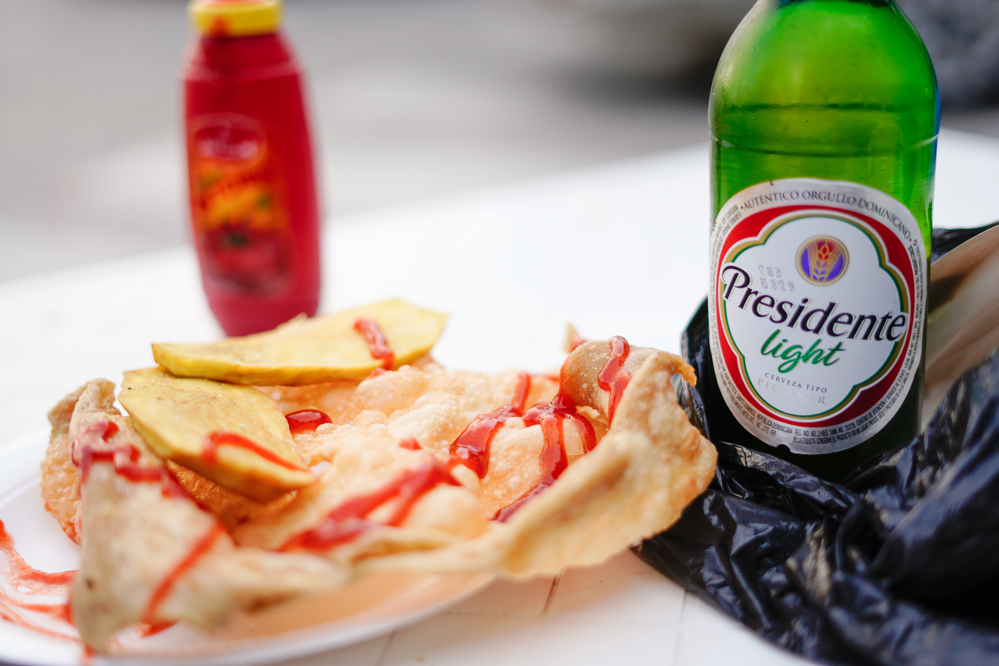 Yaniqueque and Presidente beer