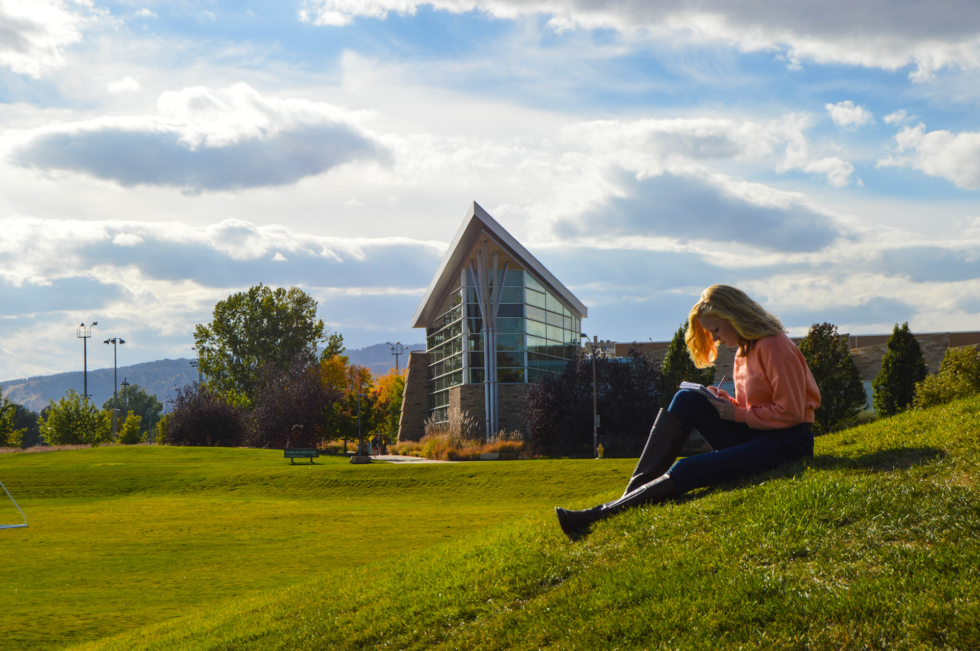 Darby sits on her favorite hill on campus. She loves to sit in the sun and gain inspiration on a nice autumn afternoon.