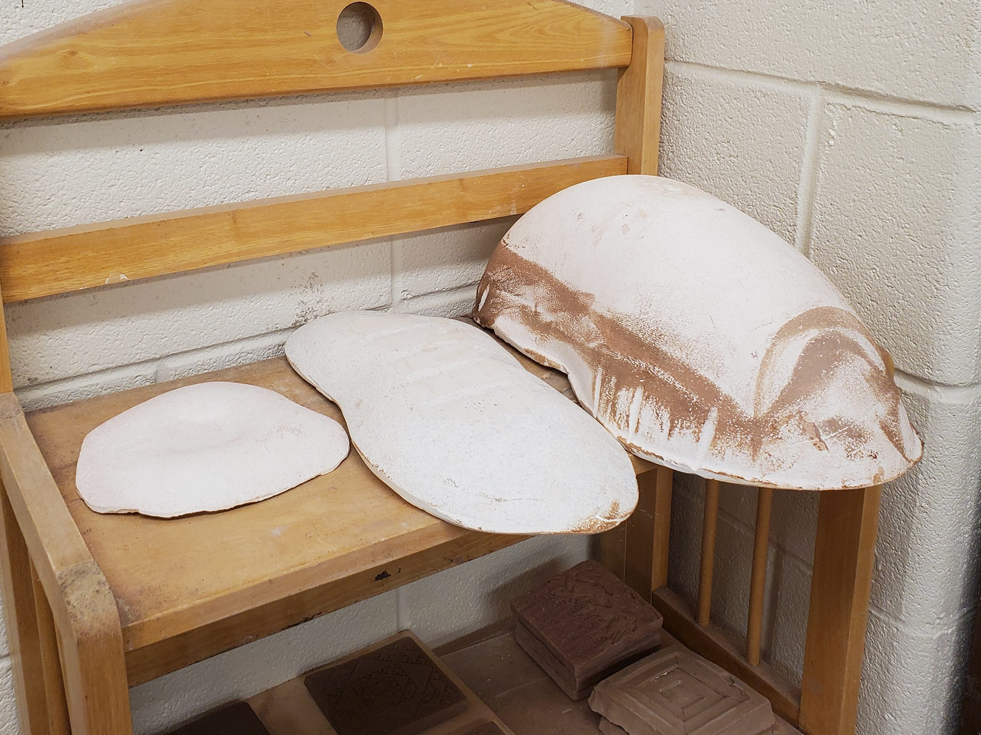 Three homemade plaster molds, the two on the left are brand new and the one on the right has been used.