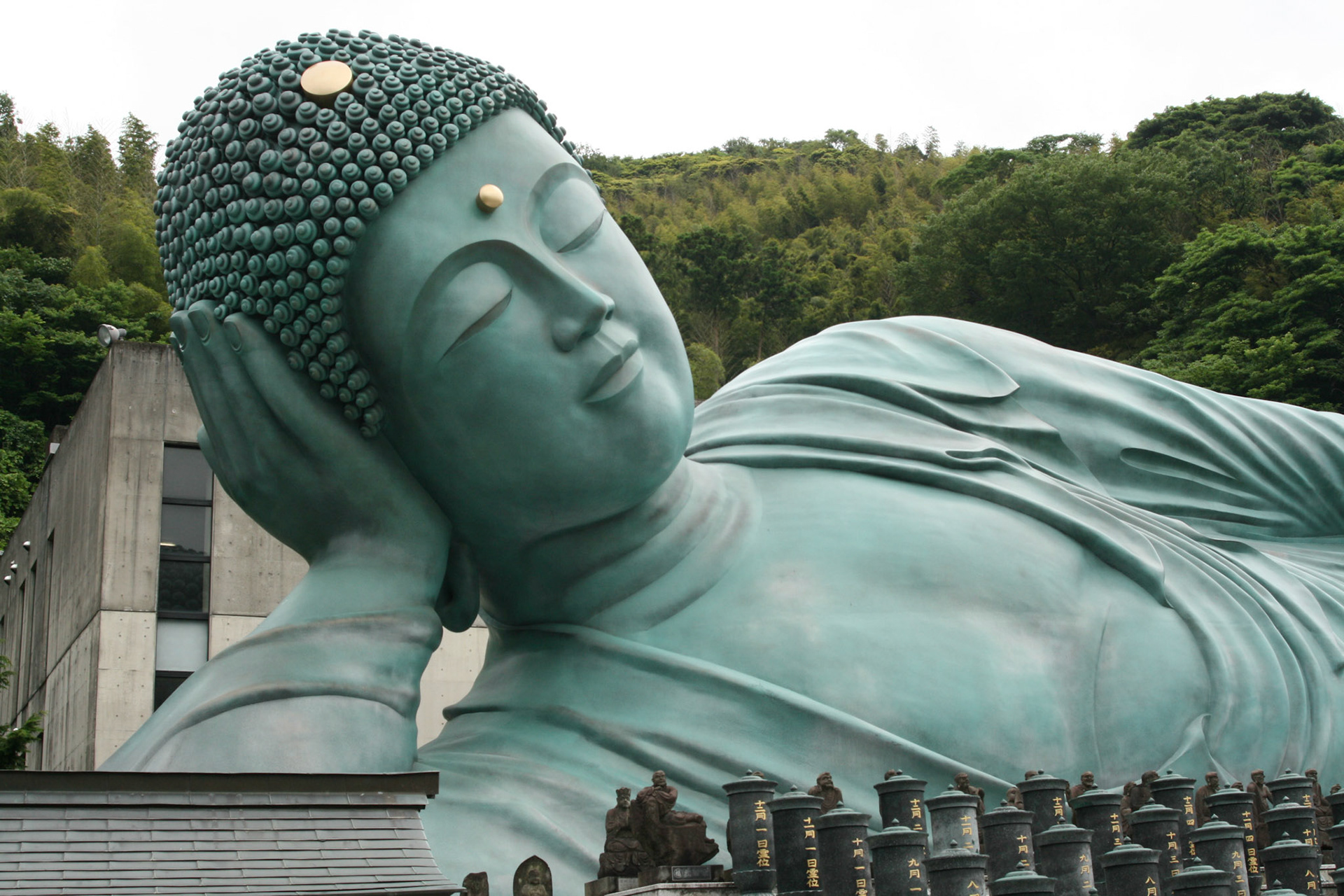 The inside of the Buddha is hollow and holds relics, like ashes of Buddha and two of his adherents. 