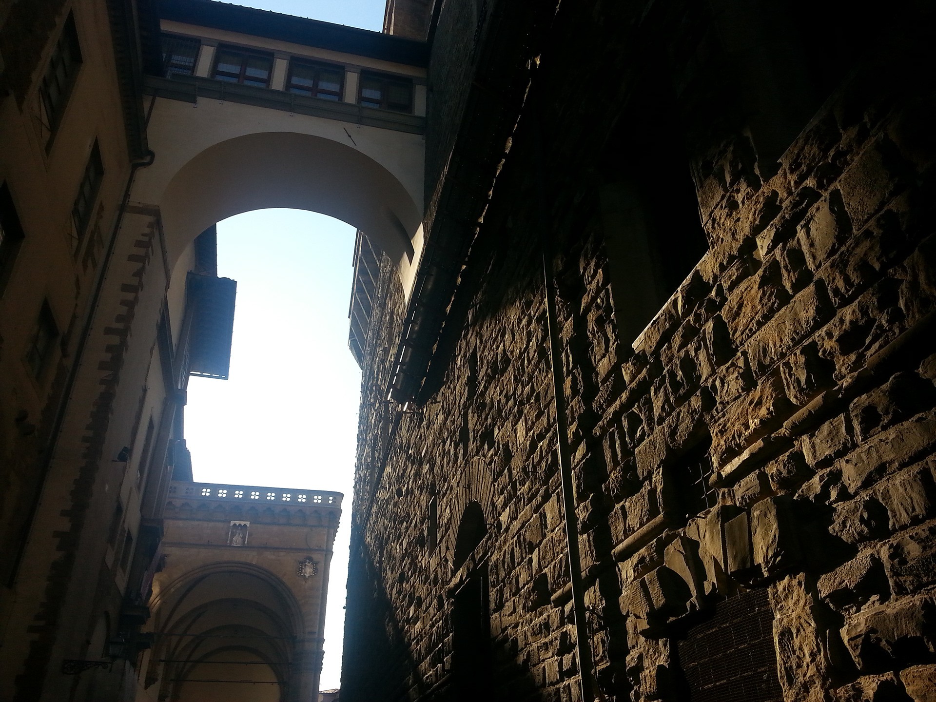 The Vasari Corridor Bridge, Via della Nina, Florence - The Vasari Corridor (Italian: Corridoio Vasariano) is an elevated enclosed passageway in Florence, which connects the Palazzo Vecchio with the Palazzo Pitti. The bridge connects Uffizi Gallery on the right to The Palazzo Vecchio (Old Palace). 