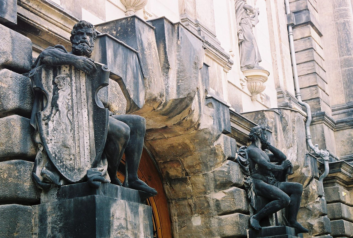 Statuary adorn an entrance to the Academy of Fine Arts 