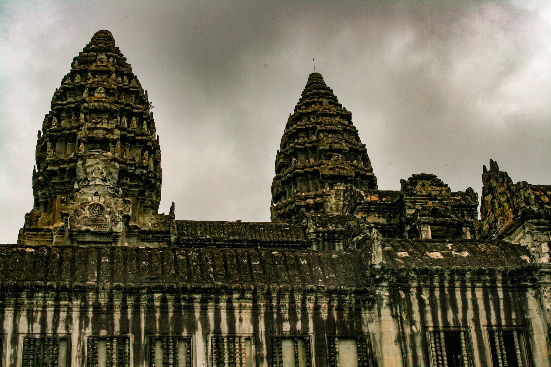 Angkor Wat meaning "Temple City" is a temple complex in Cambodia and is the largest religious monument in the world on a site measuring 162.6 hectares (1,626,000 m2; 402 acres). Breaking from Shaiva tradition of previous kings, Angkor Wat was dedicated to Vishnu for the Khmer Empire. 