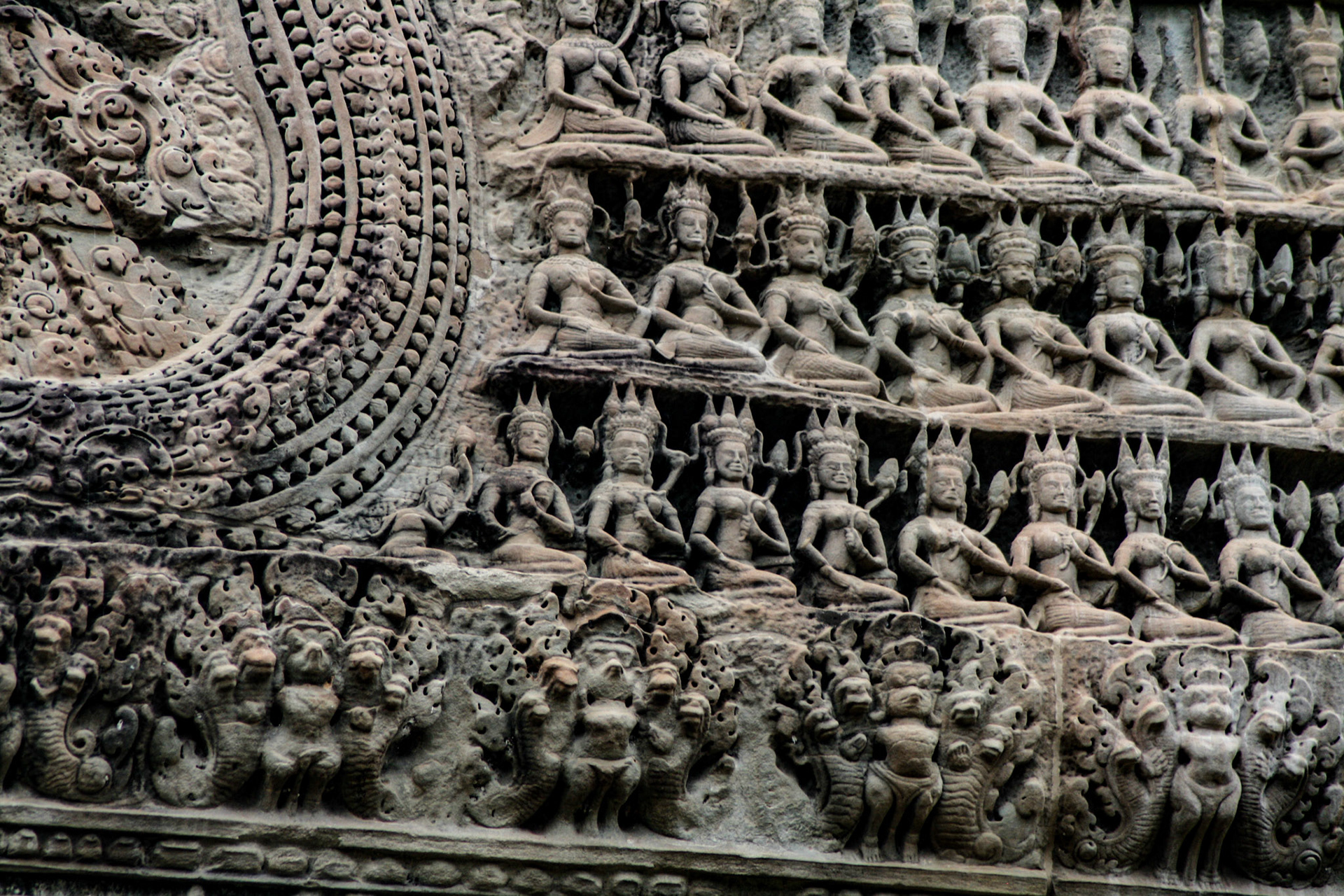 Ancient Khmer bas relief frieze of the Hindu gods. Wall of Angkor Wat temple.