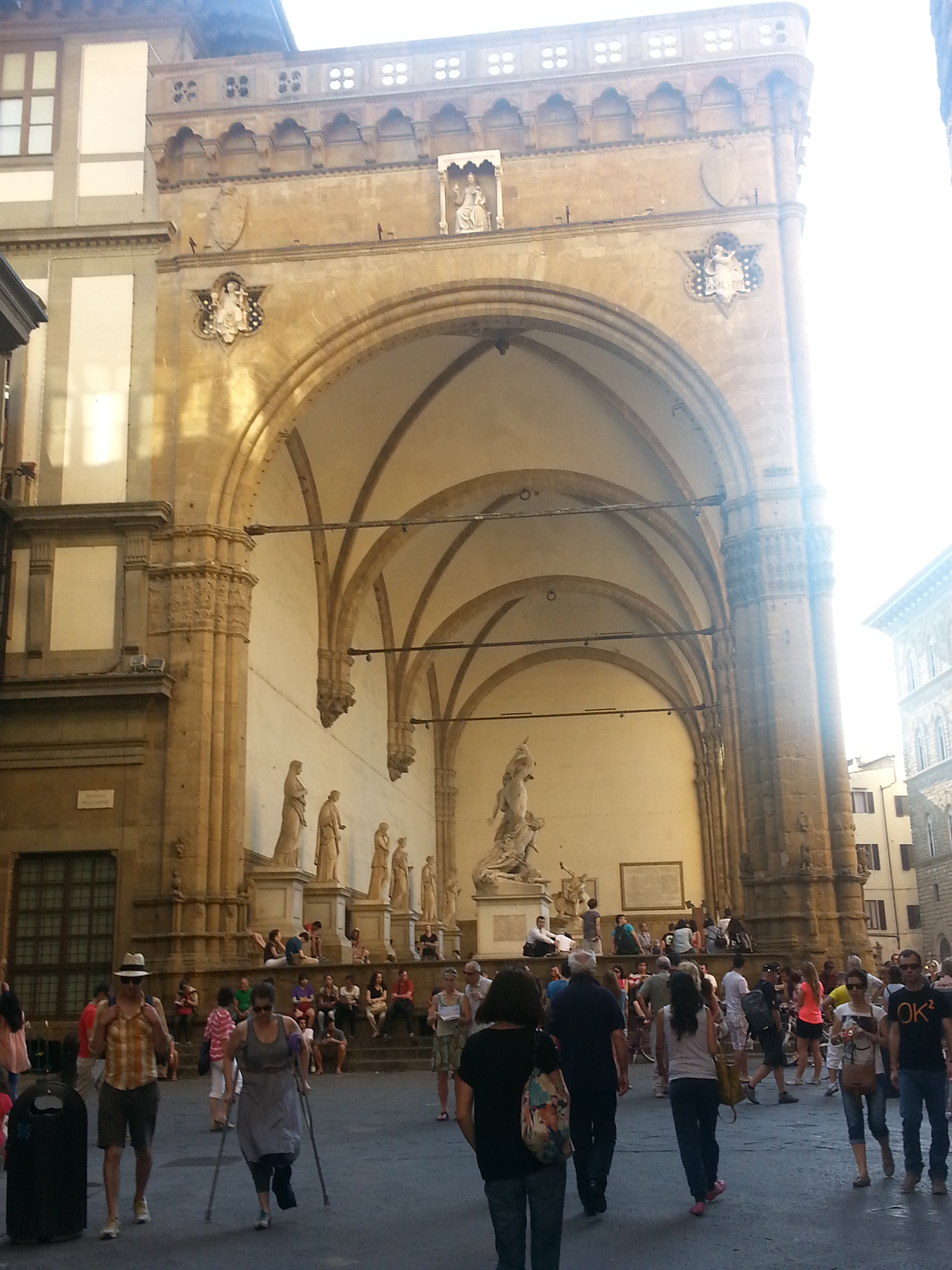 The graceful Loggia dei Lanzi, which sits to the right of Palazzo Vecchio and functions as an open-air sculpture gallery, was designed by Orcagna in 1376. Its curved arches foretell Renaissance classicism. 