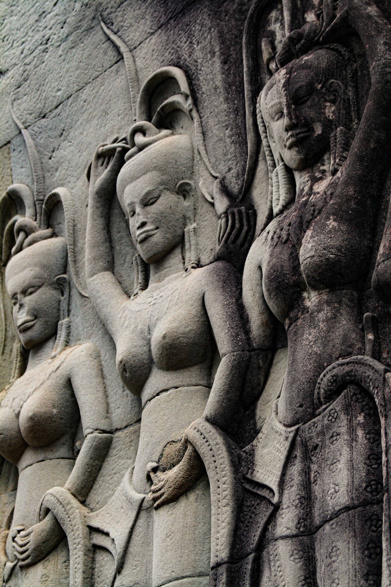 Bas-reliefs are individual figures, groups of figures, or entire scenes cut into stone walls, not as drawings but as sculpted images projecting from a background. 