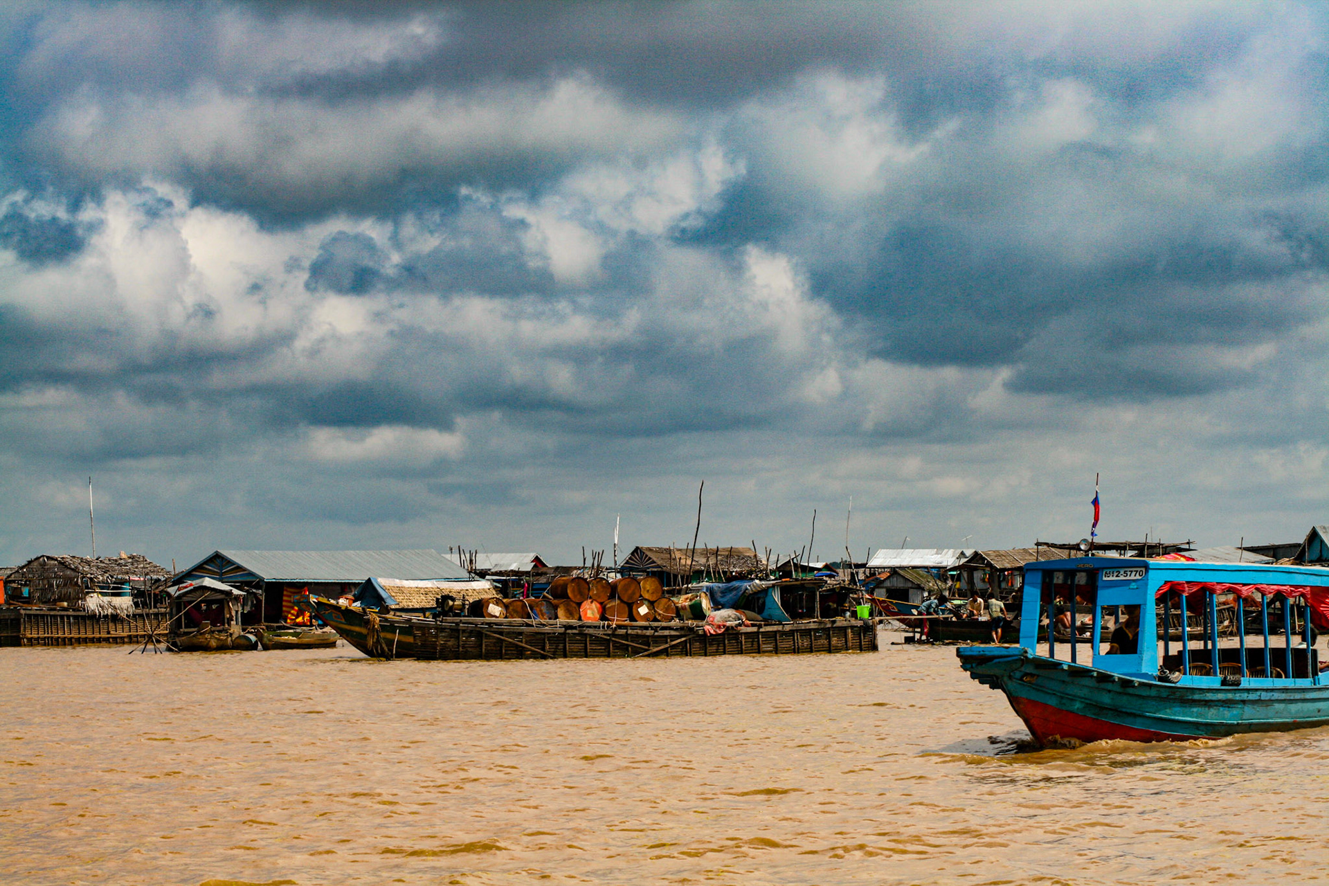 During the June-to-November monsoonal regime, the swollen Mekong reverses the southeastward flow of the Sab River, which increases Tonle Sap’s area from about 1,050 square miles (2,700 square km) to about 4,000 square miles (10,360 square km); its depth also increases from 3–10 feet (0.9–3 m) to 30–45 feet (9–14 m), permitting vessels with 9 feet (3 m) of draft to navigate it up through the various tributaries. 