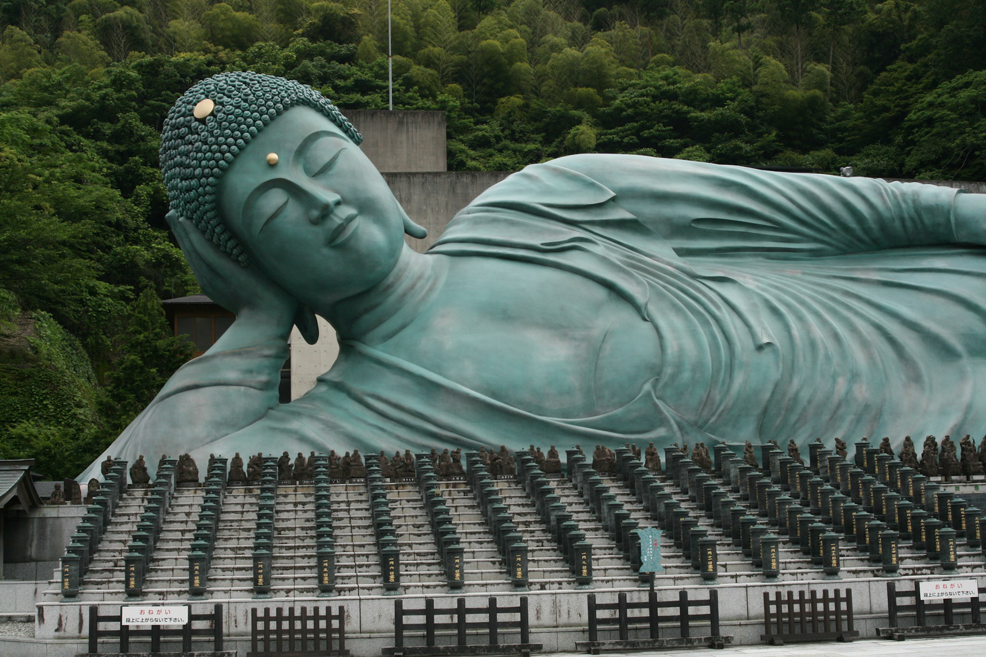Statue of the Reclining Buddha known as either Nehanzo or Shaka Nehan ("Nirvana"): The statue was built in 1995. It has a total length of 41 meters, height of 11 meters, and weight of 300 tons. It is the world’s largest bronze statue of the Buddha reclining as he enters Nirvana. 