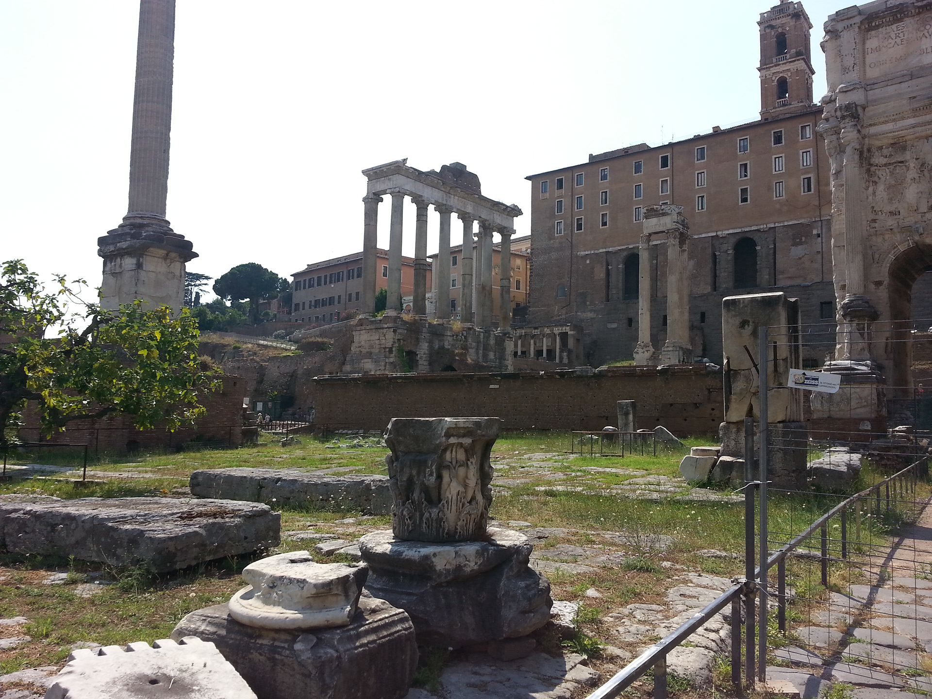 The Temple of Saturn and the Tabularium (building) beyond that. The Forum, Rome, Italy.