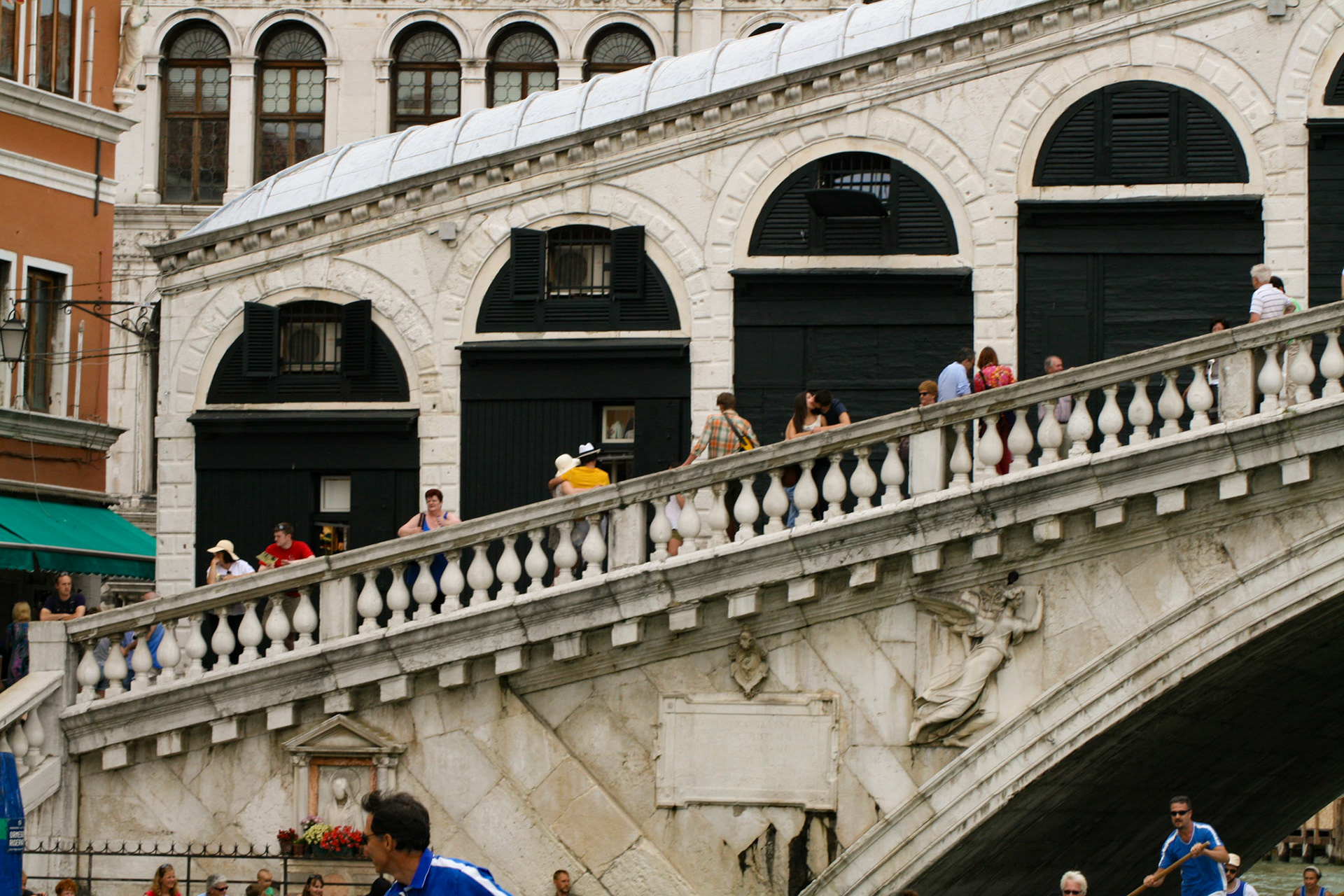The Rialto Bridge (Italian: Ponte di Rialto; Venetian: Ponte de Rialto) - The shops lining the central passage make the bridge especially picturesque.