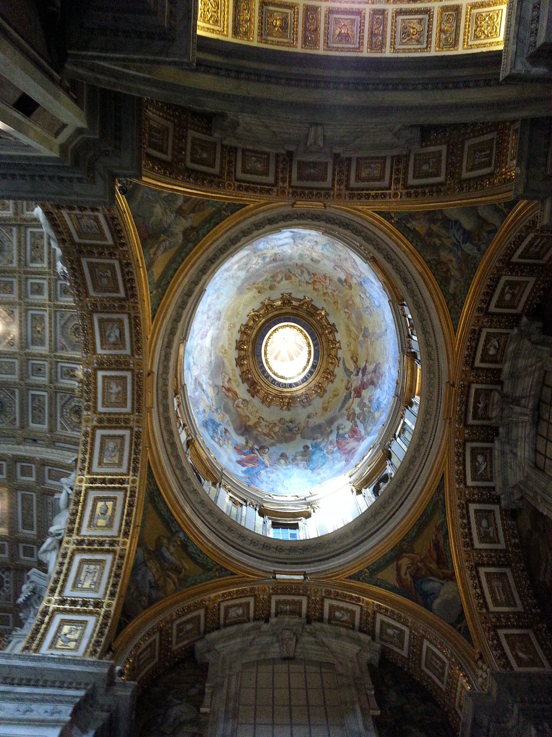 View of the ornamented domes and ceilings of the Basilica di San Pietro church in the Vatican. 