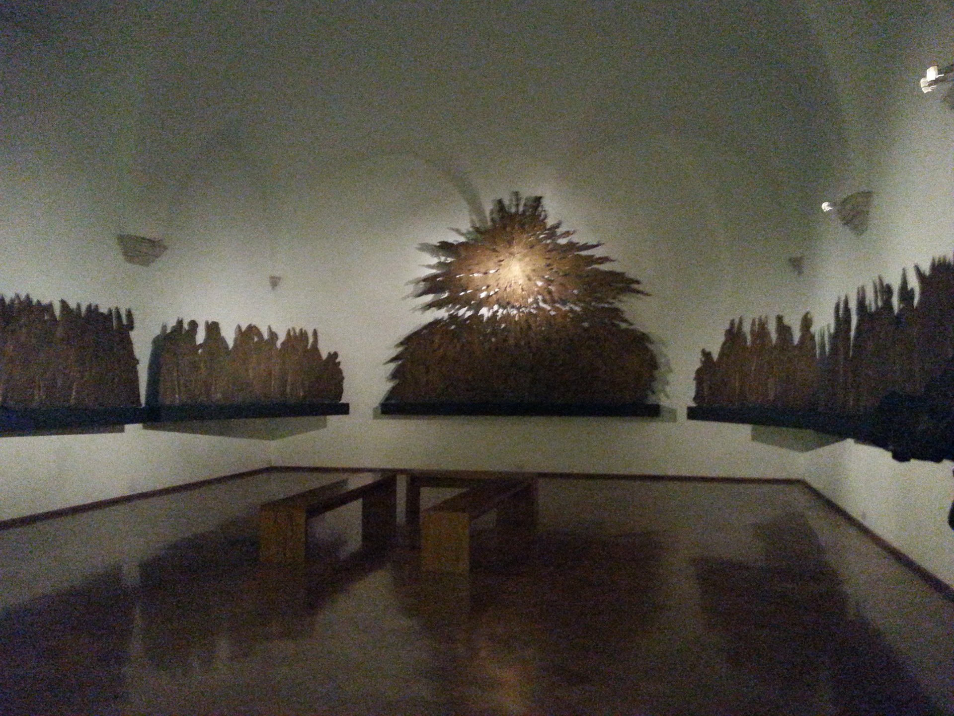 The Collection of Modern Religious Art at the Vatican Museum contains nearly 800 works of art. This is a bronze image of people praying. 