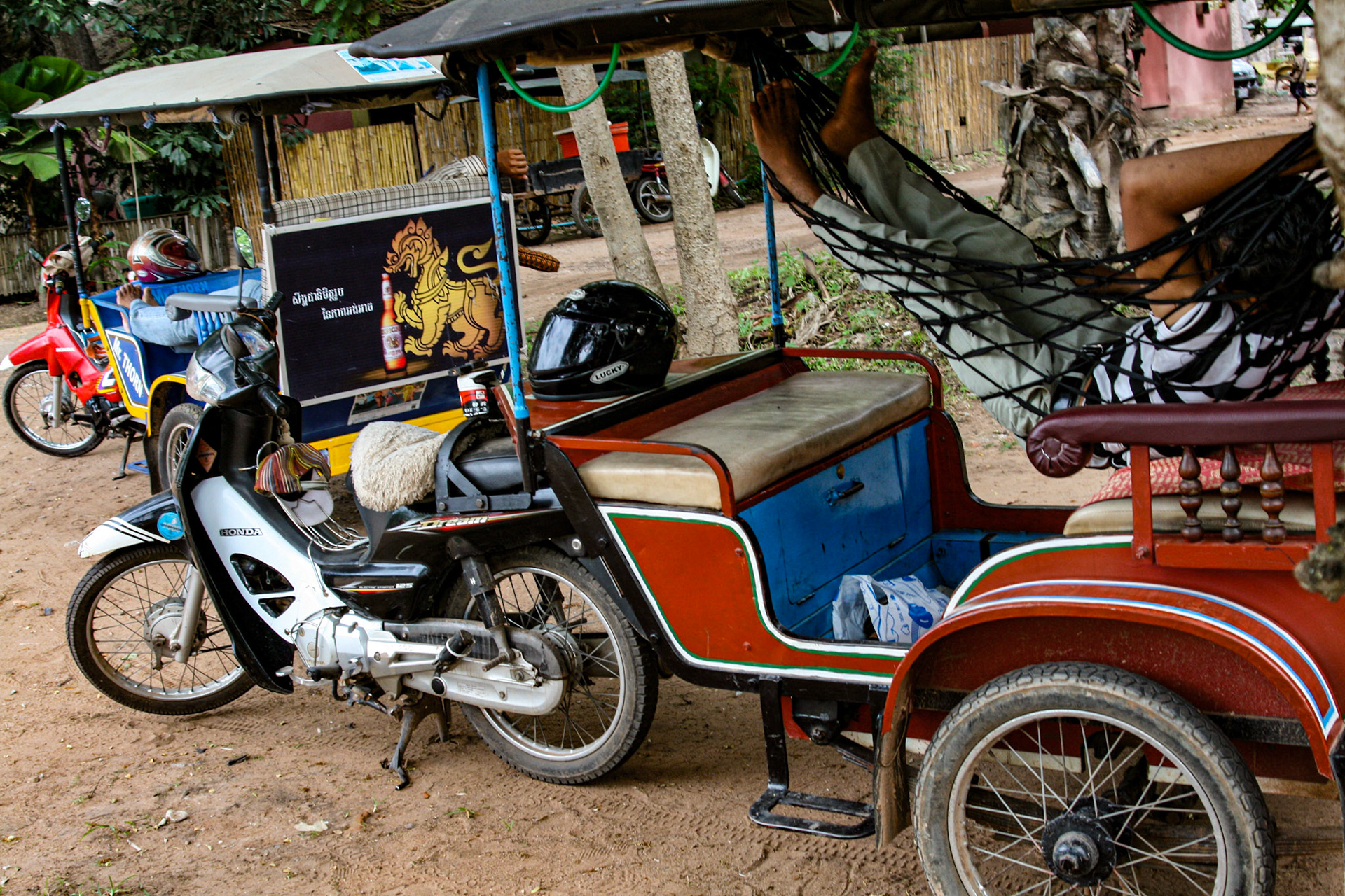 Tuk-tuks--so-called because of the sound they make traveling down the streets--are a very common scooter-powered form of "cab" ride.