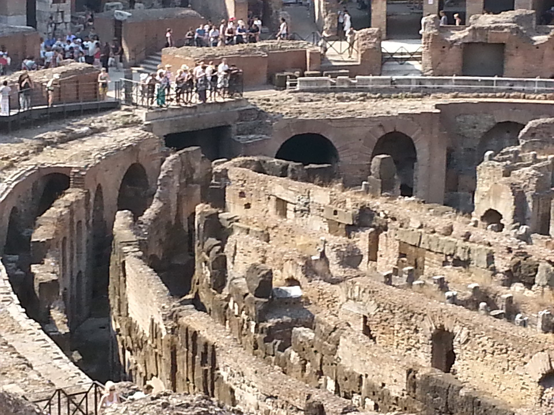 The ground level of the Colosseum is only partially constructed at one end of the amphitheater. Below that level are the chambers where they kept the gladiators and various beasts before the slaughter began. 