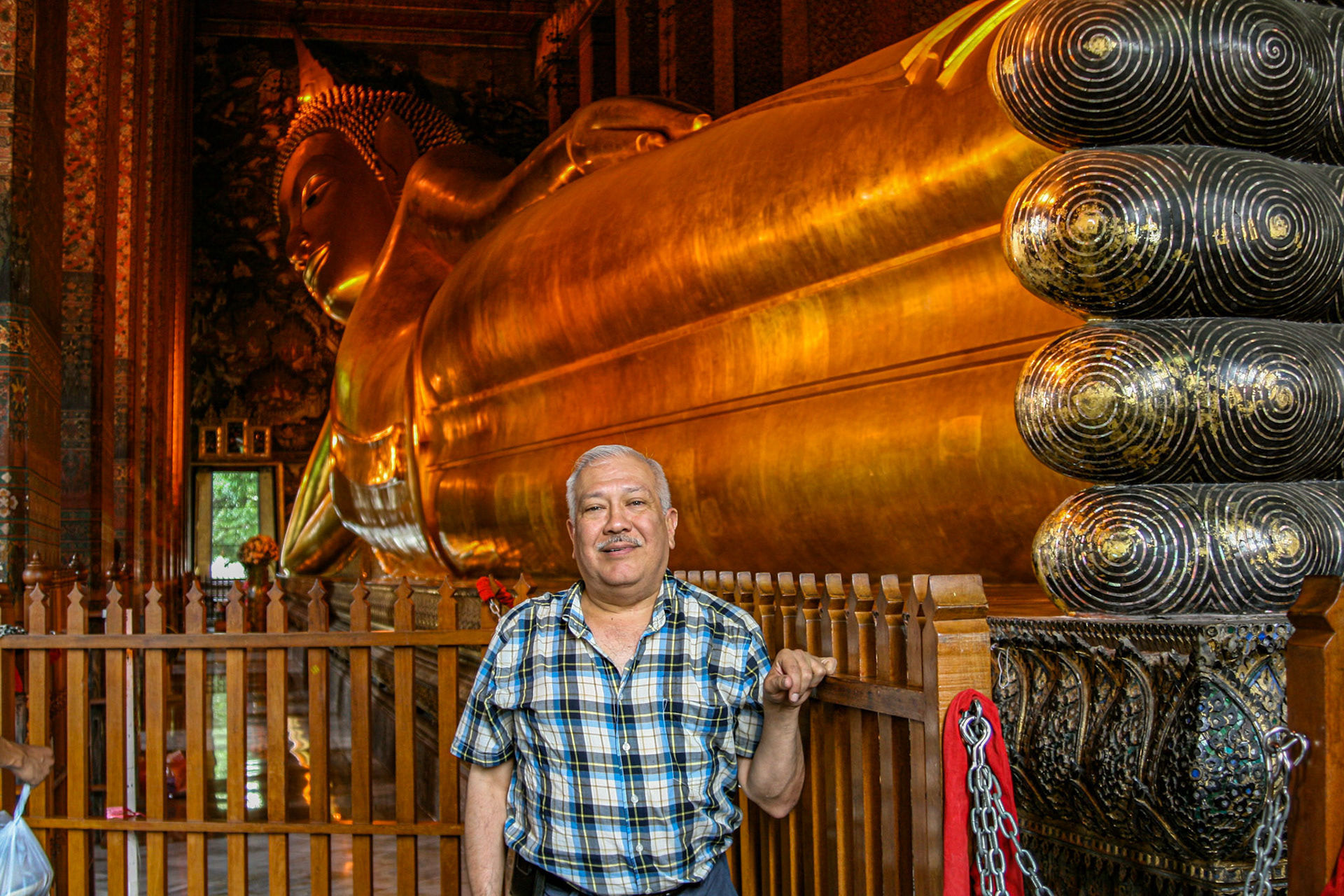 Known also as the Temple of the Reclining Buddha, its official name is Wat Phra Chetuphon Wimon Mangkhalaram Rajwaramahawihan. The temple complex houses the largest collection of Buddha images in Thailand, including a 46 m long reclining Buddha.  The image of the reclining Buddha represents the entry of Buddha into Nirvana and the end of all reincarnations.