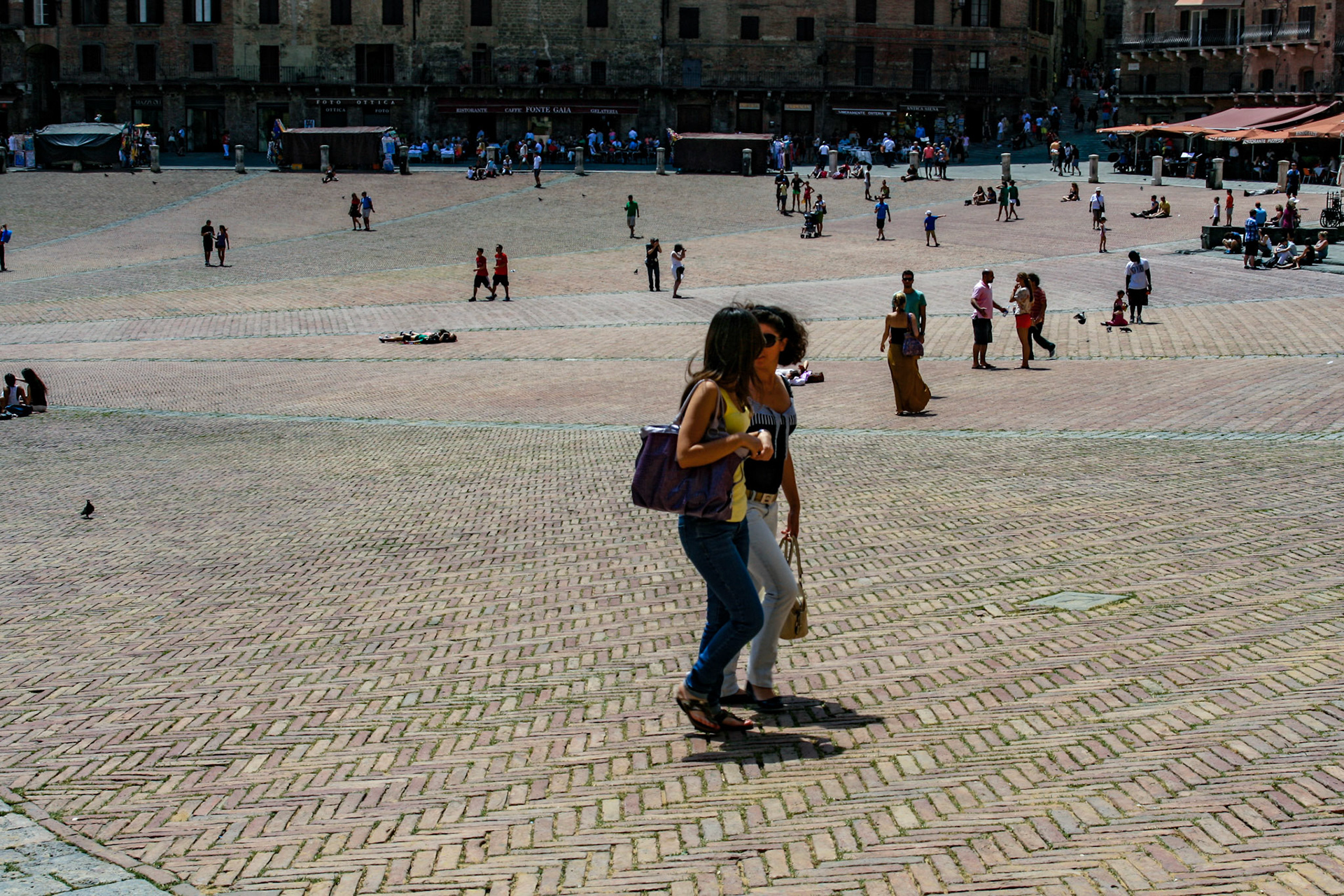 The open site was a marketplace established before the thirteenth century on a sloping site near the meeting point of the three hillside communities that coalesced to form Siena: the Castellare, the San Martino and the Camollia. 