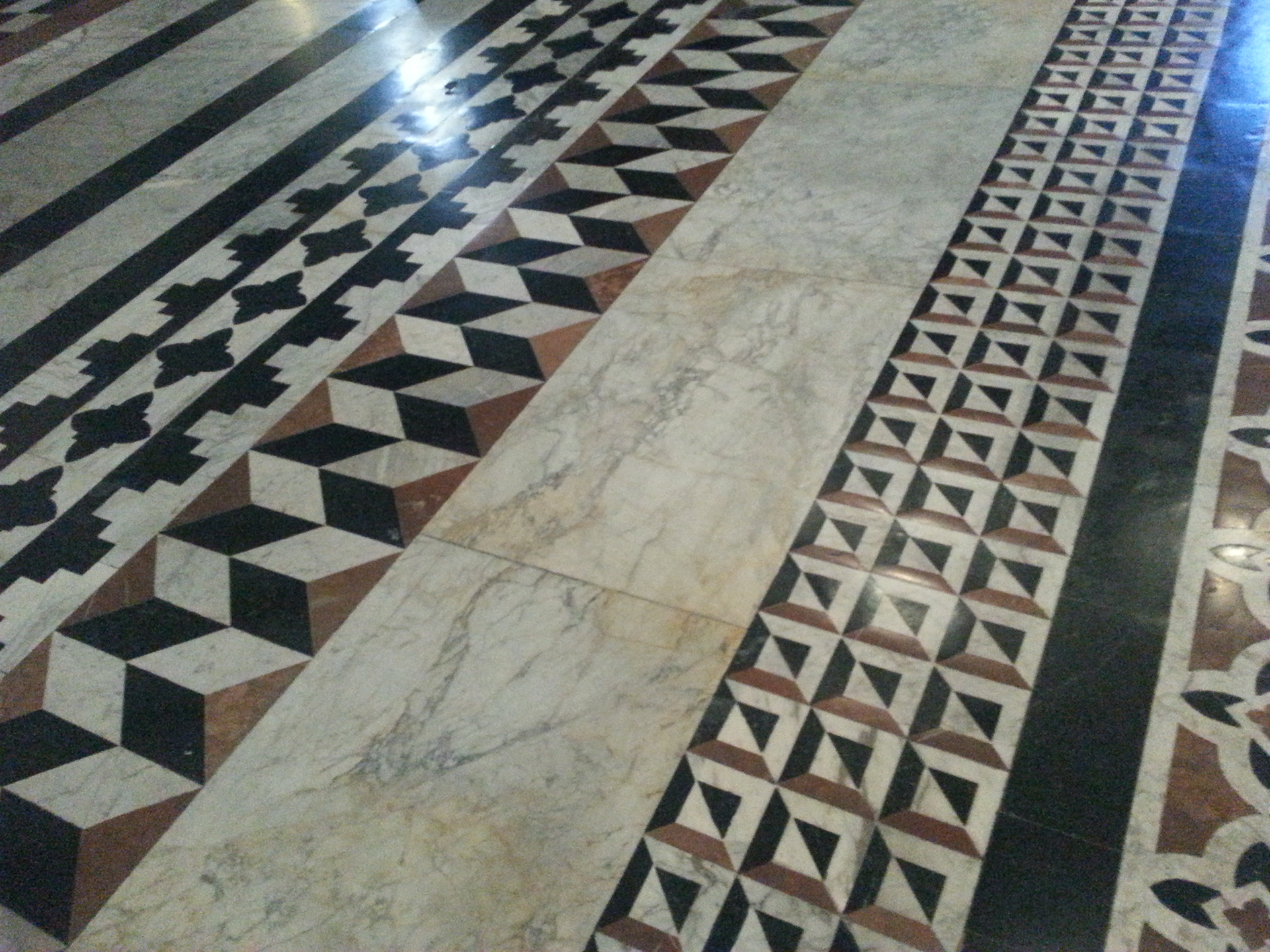    Details of the marble floor of the Duomo, Siena cathedral in Siena, Italy. 