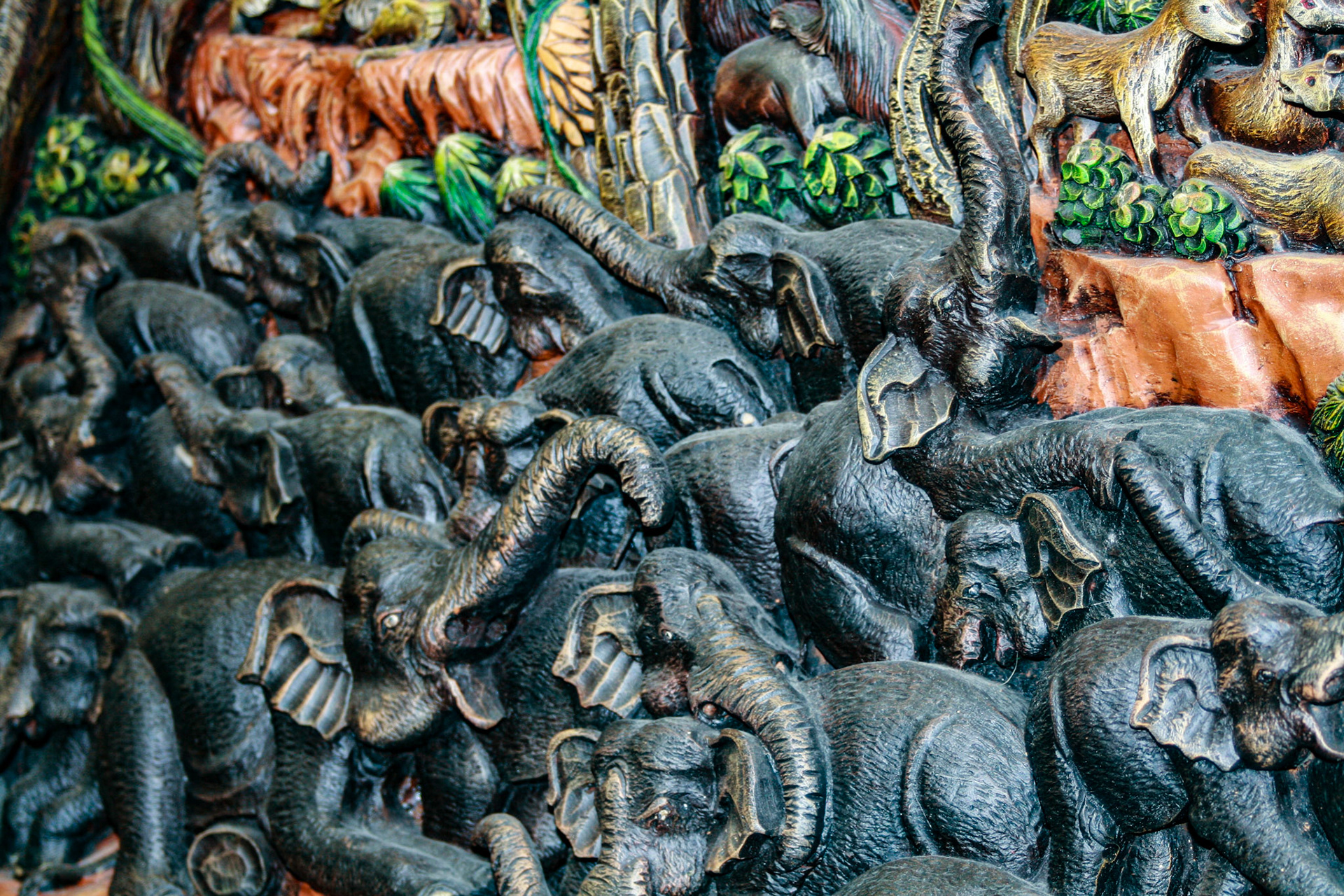 Wood carving at a Teakwood art factory.