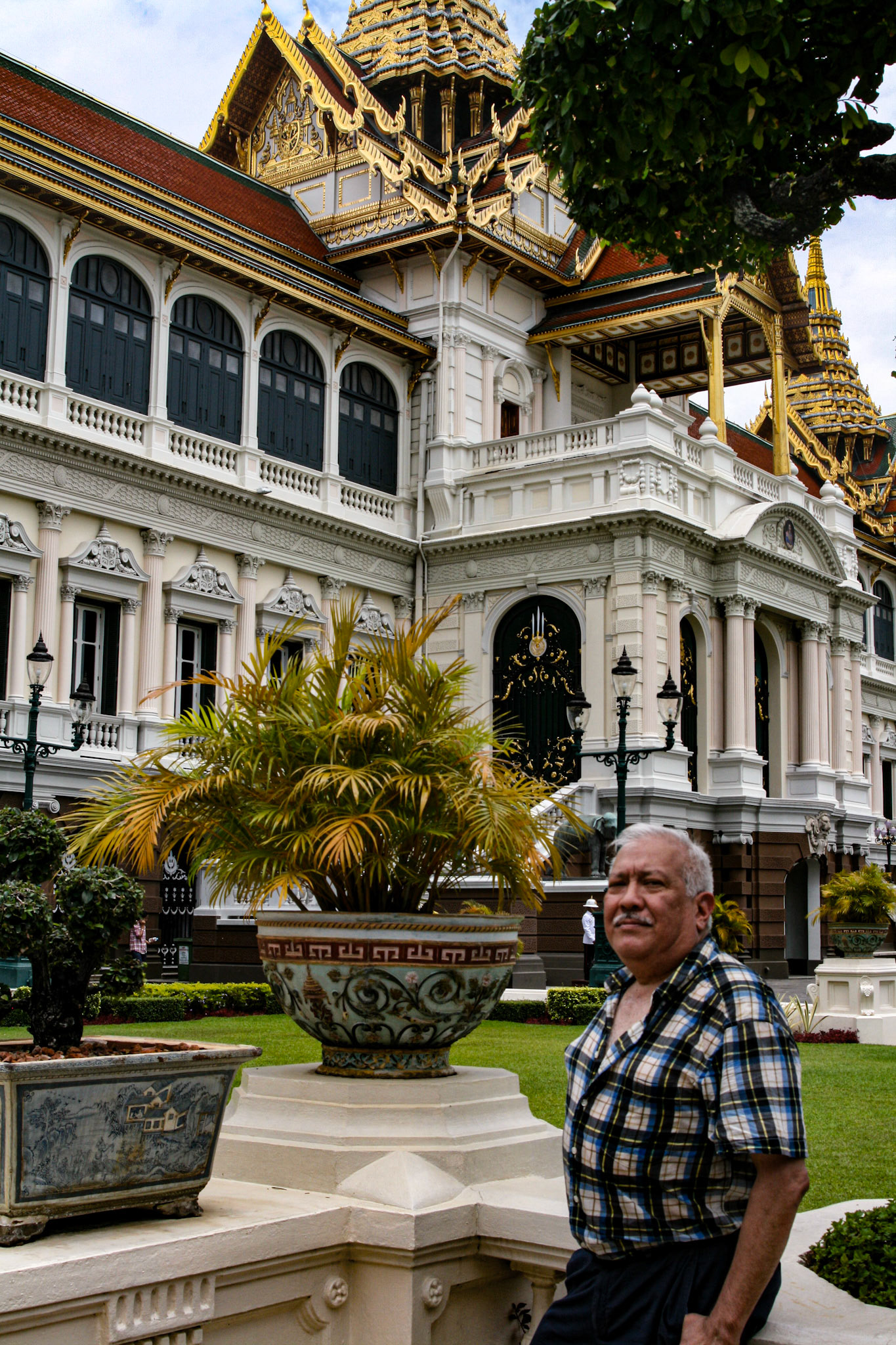 Sam Luna poses in front of The Chakri Maha Prasat Hall, The Grand Palace, Bangkok, Thailand 