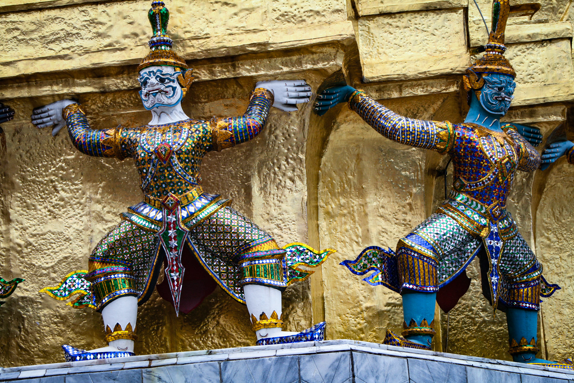 Statues of Yaksha demons, Wat Phra Kaew temple, Grand Palace, Bangkok, Thailand 