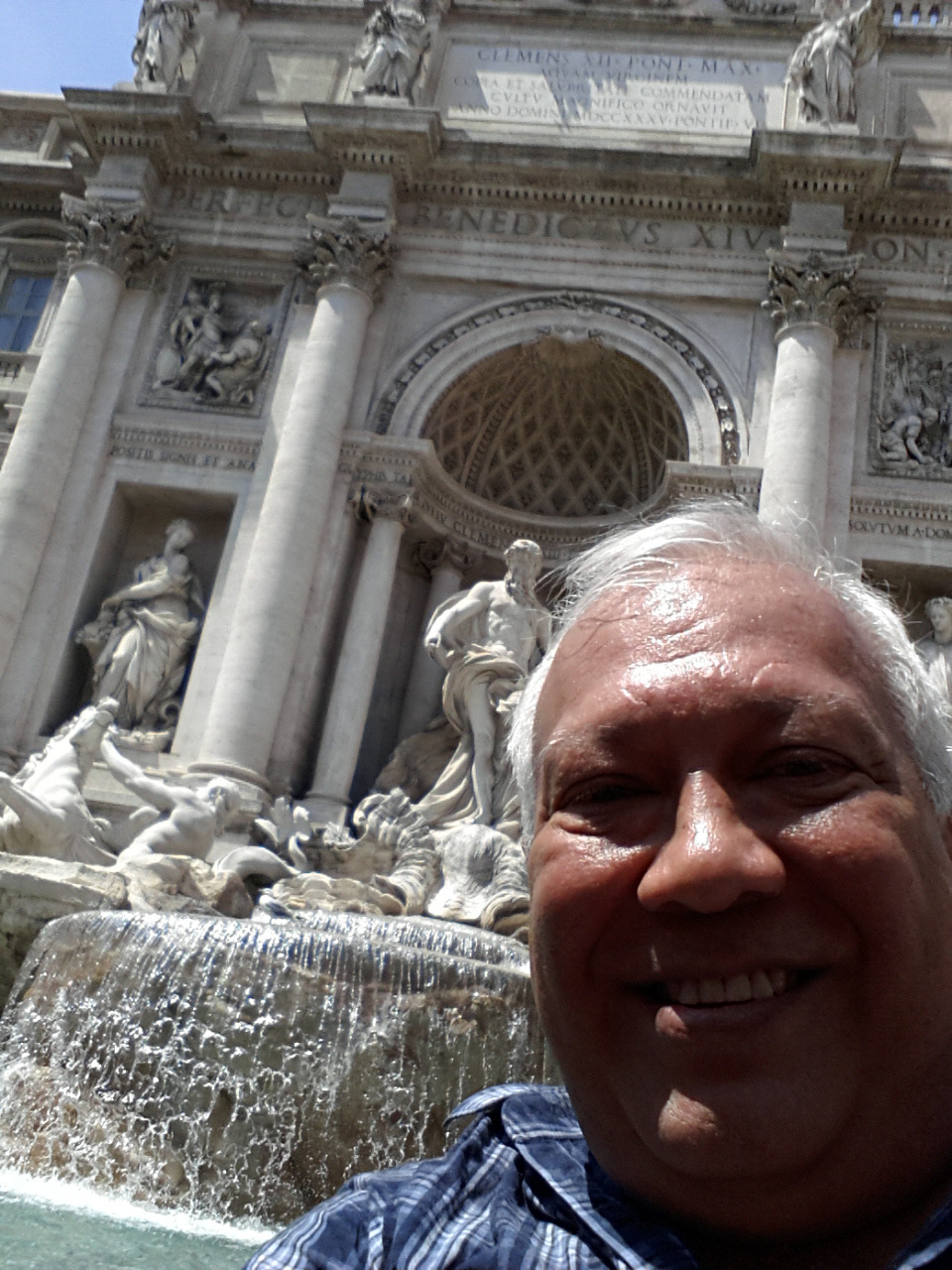 Sam Luna in front of Trevi Fountain.