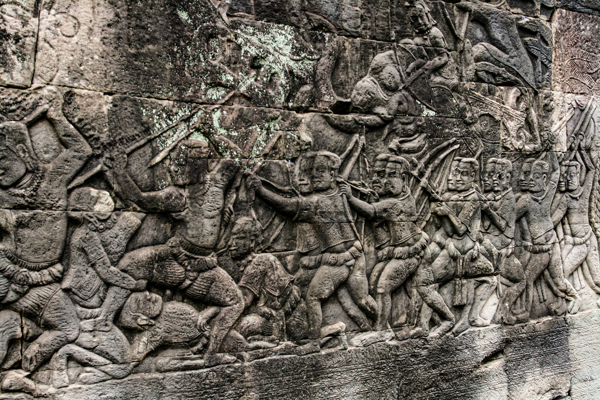Army of archers with arrows and bows, bas-relief inside 12th century Bayon temple, Angkor Thom of Cambodia. 