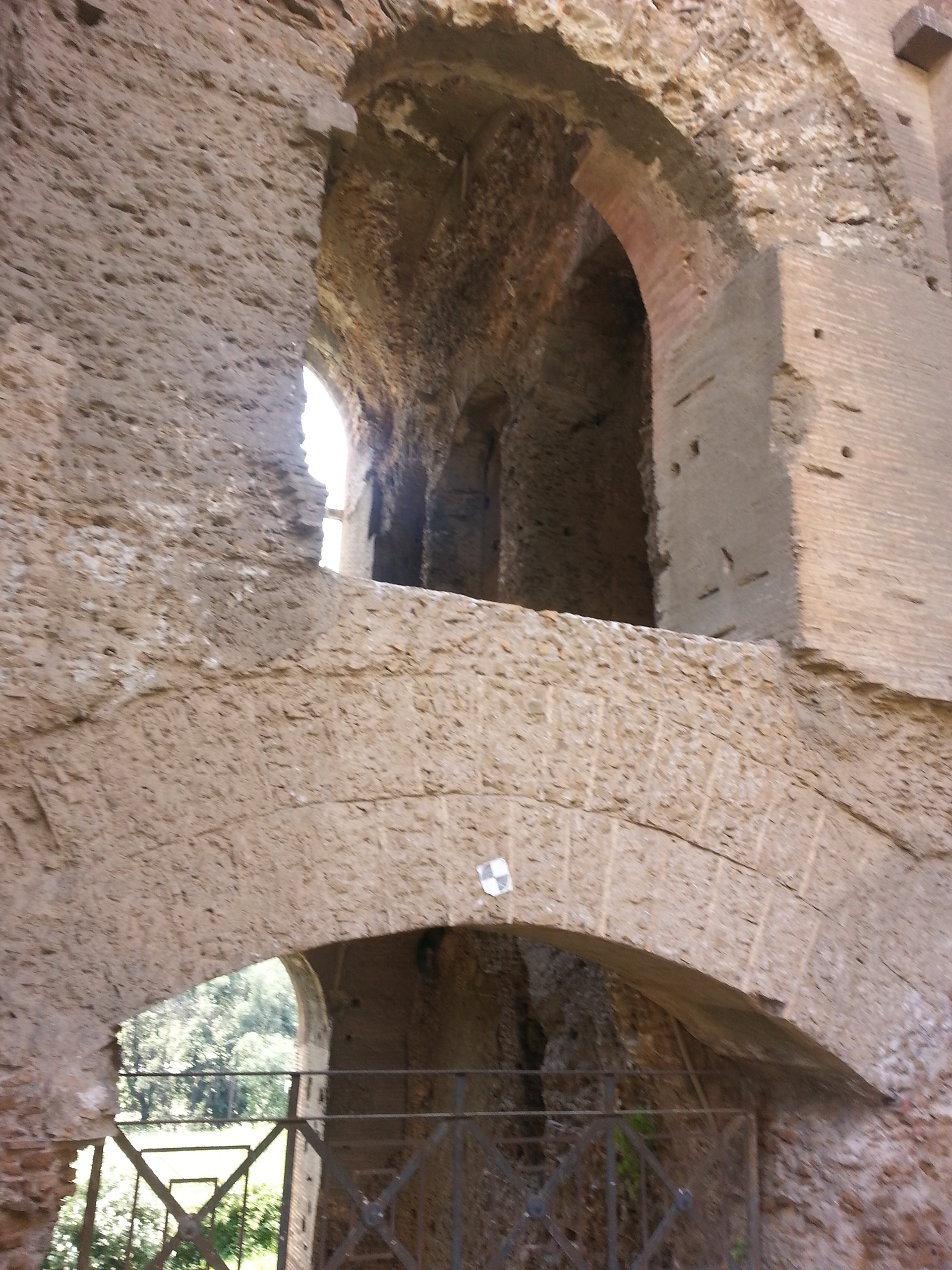 THE "SEVERIAN ARCADES" - The imposing vaulted rooms supported by brick pillars overlook the Circus Maximus and must have been closely connected to it. Given the absence of intermediate levels or decorations these "Arcades” must have served principally to create an artificial terrace on which the new wing of the palace was built, already in the Flavian period. After its enlargement by Septimius Severus, the road leading directly to the Stadium from the south-eastern corner of the Palatine, passing under the arcades, became a covered road (vicus tectus). 