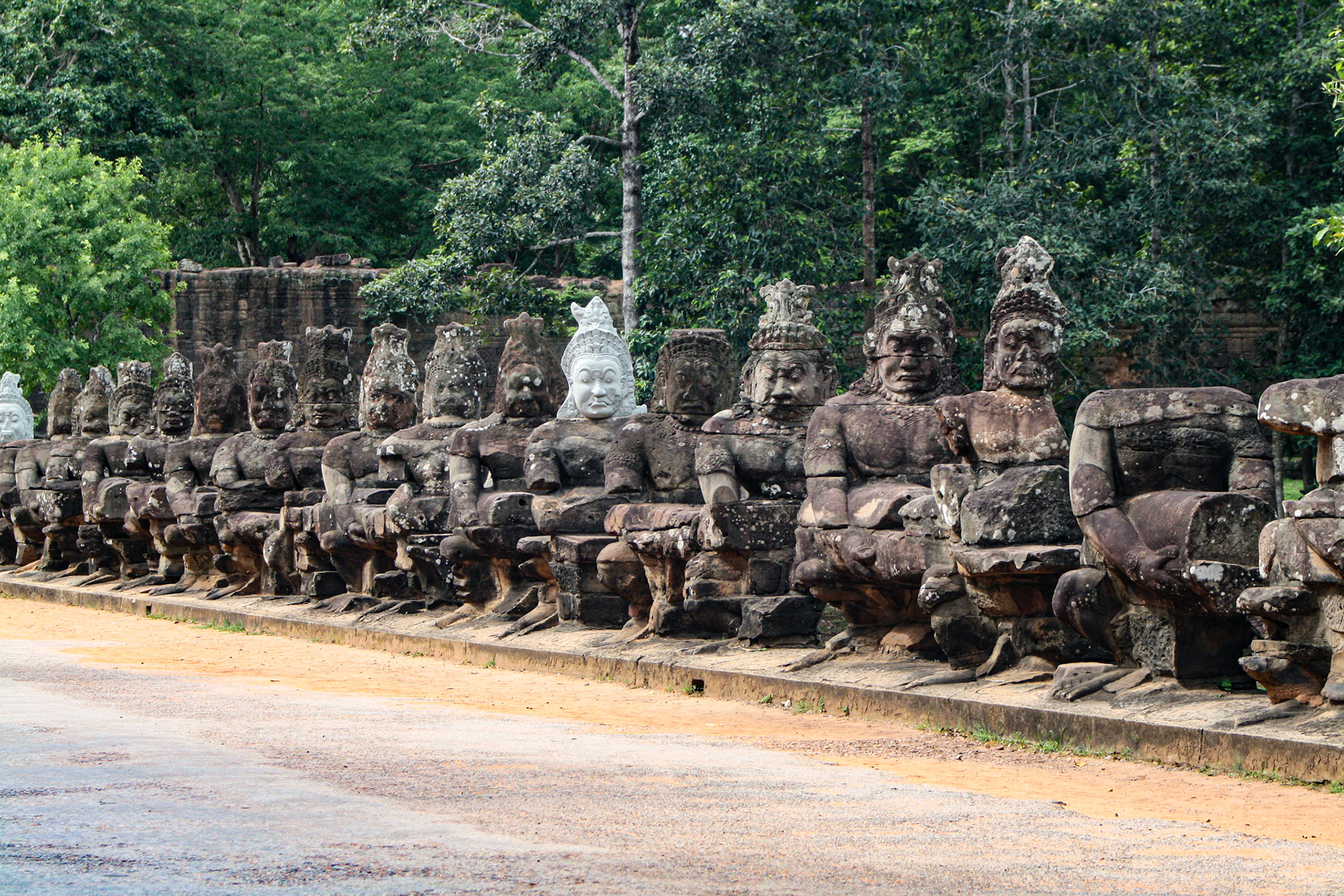Ancient statues of gods at the South Gate of UNESCO s World Heritage Site of Angkor Thom, Siem Reap, Cambodia. 