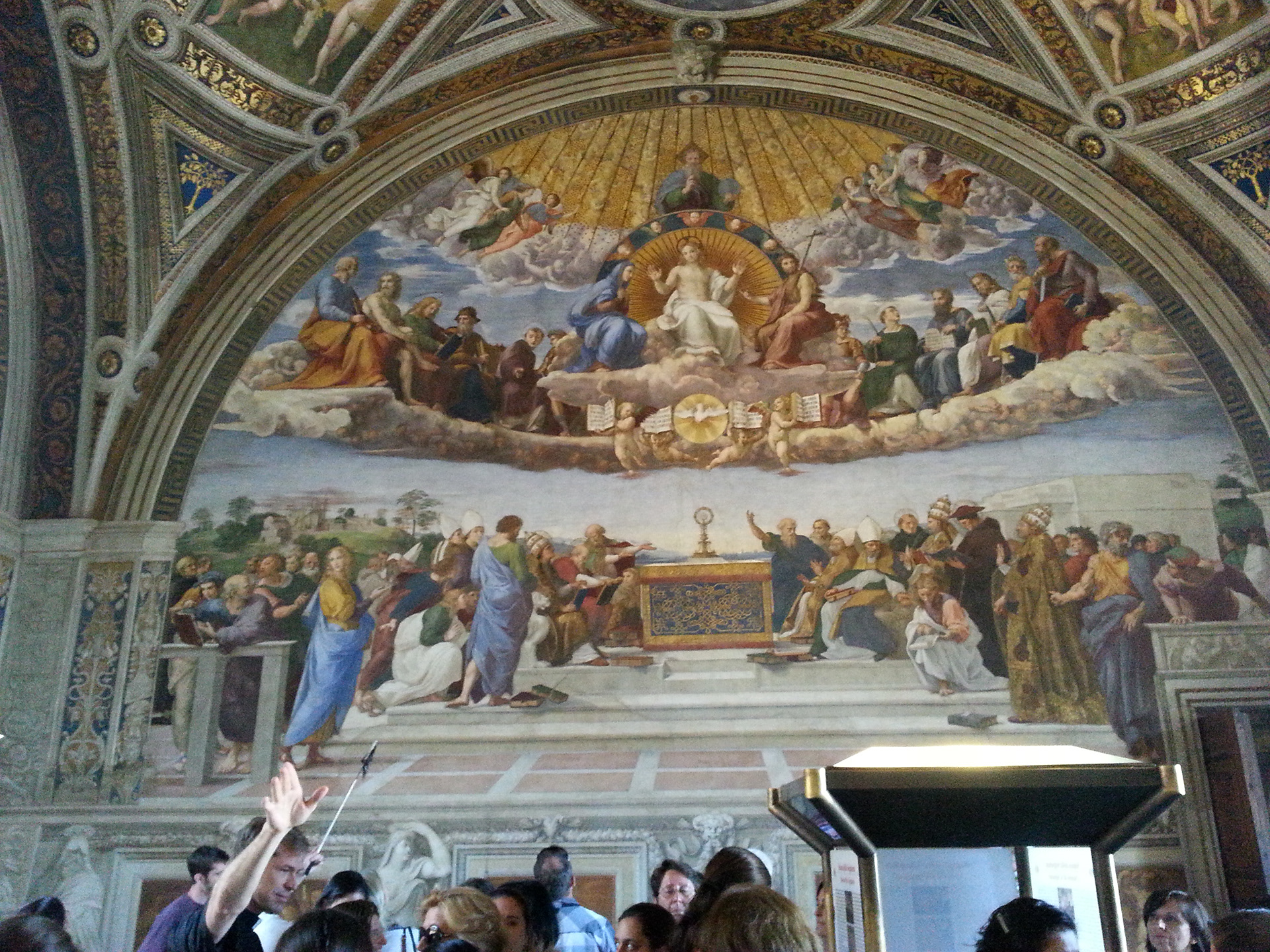 The Disputation of the Sacrament (Italian: La disputa del sacramento), or Disputa, is a painting by the Italian Renaissance artist Raphael. It was painted between 1509 and 1510 as the first part of Raphael's commission to decorate with frescoes the rooms that are now known as the Stanze di Raffaello, in the Apostolic Palace in the Vatican. At the time, this room was known as the Stanza della Segnatura, and was the private papal library where the supreme papal tribunal met. 