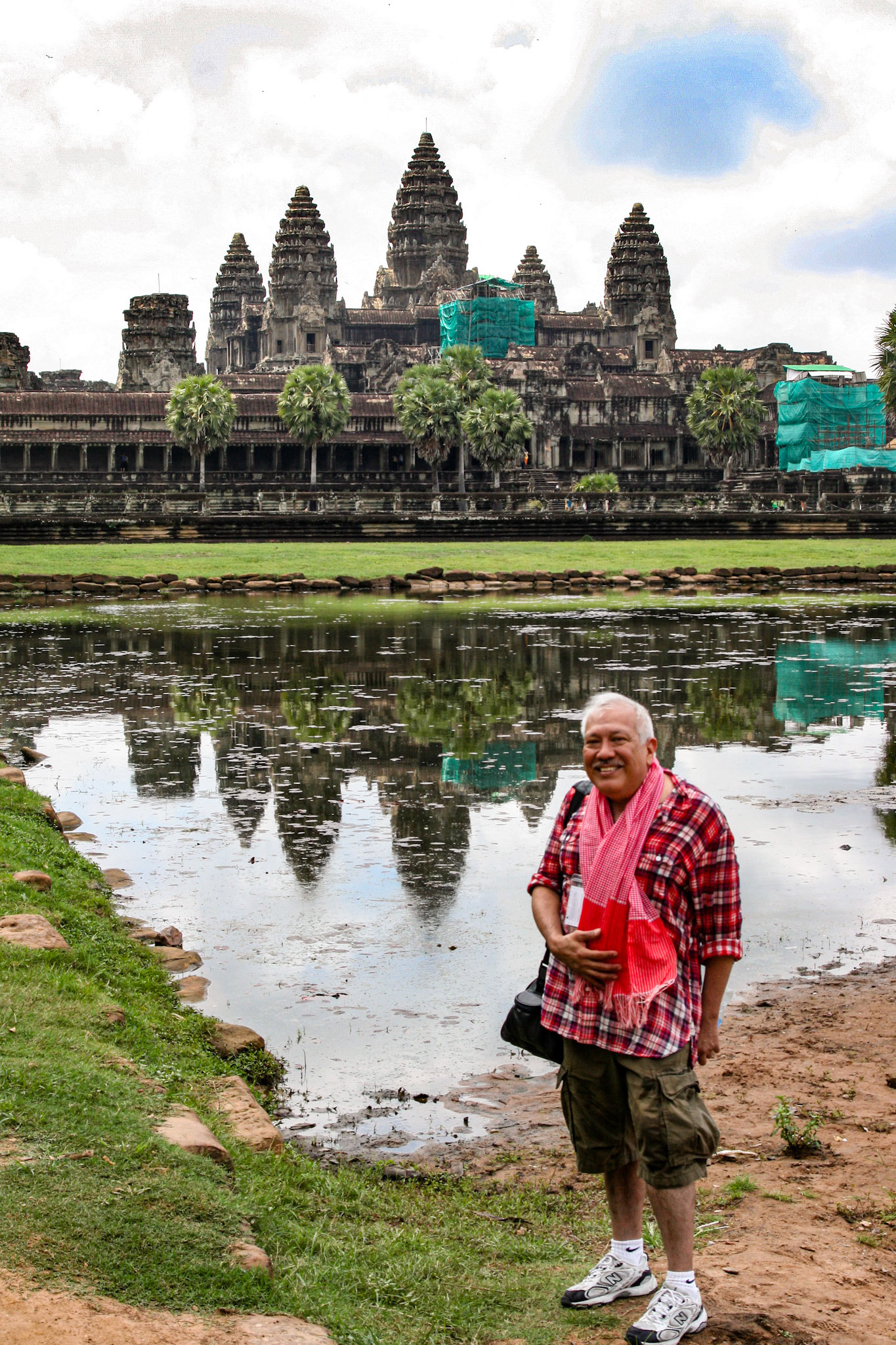 Sam Luna poses in front of Angkor Wat.
