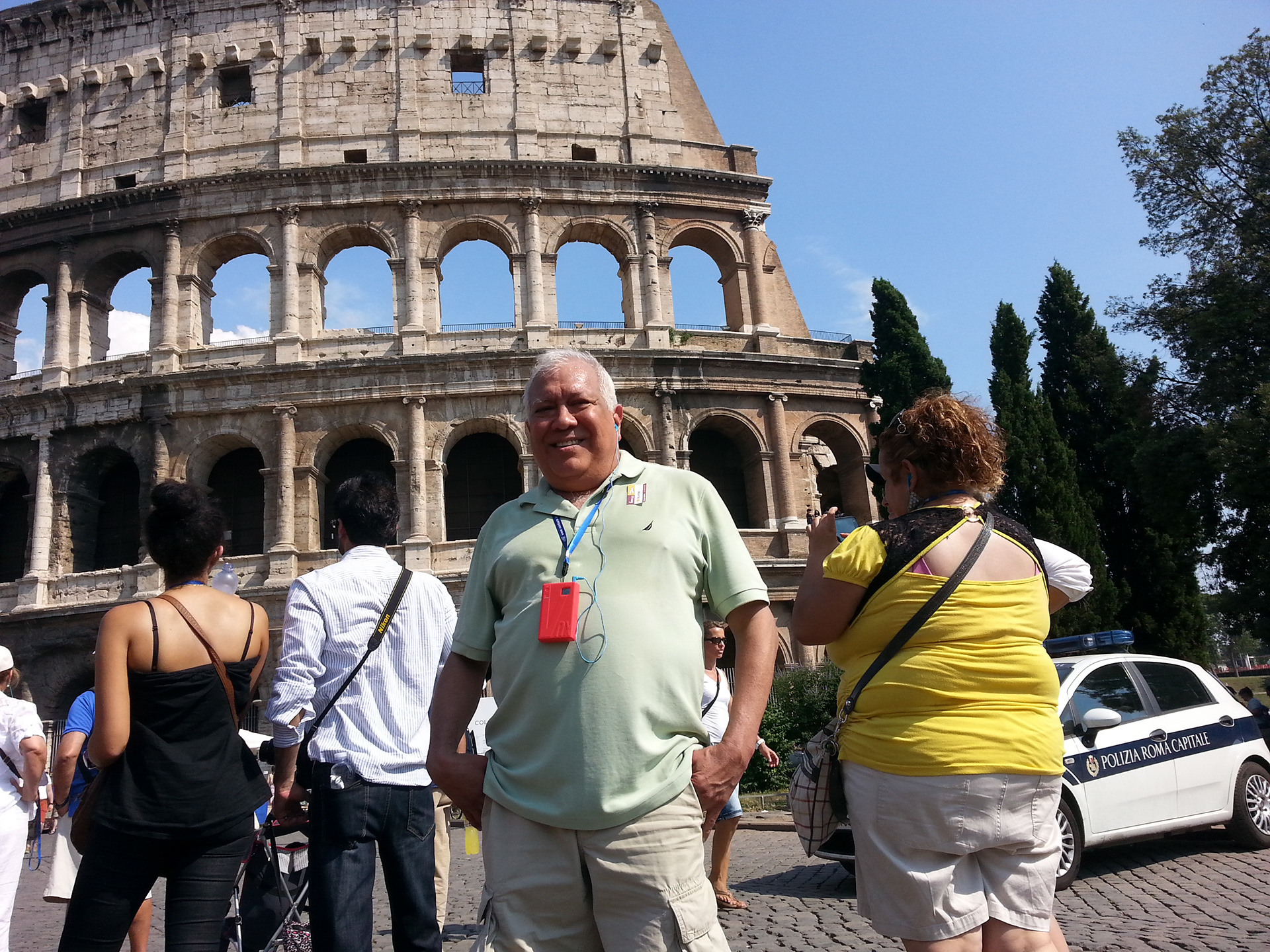Sam Luna in front of the Colosseum.