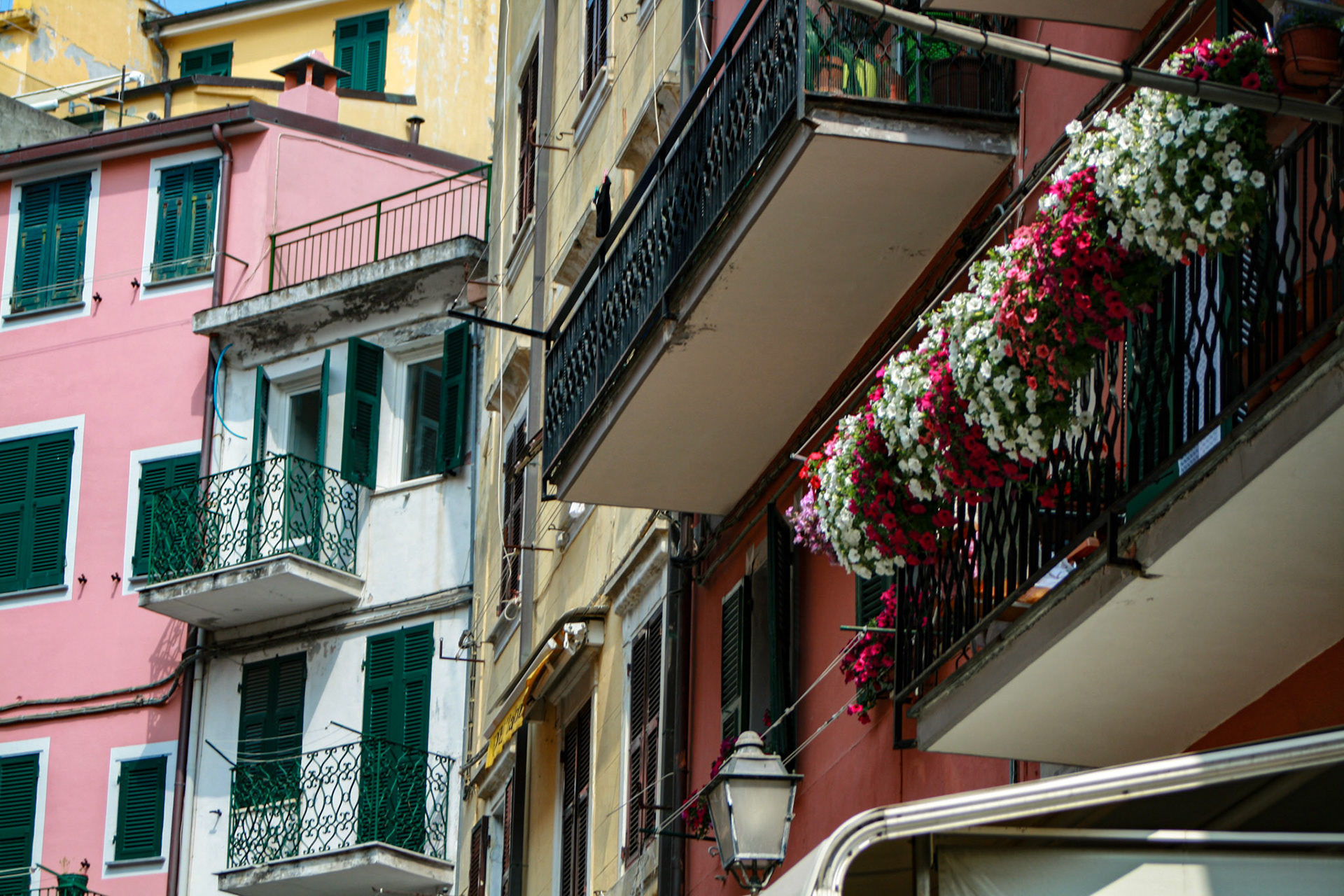 The green shutters are a nice balance to the bright colors that abound throughout the villages.