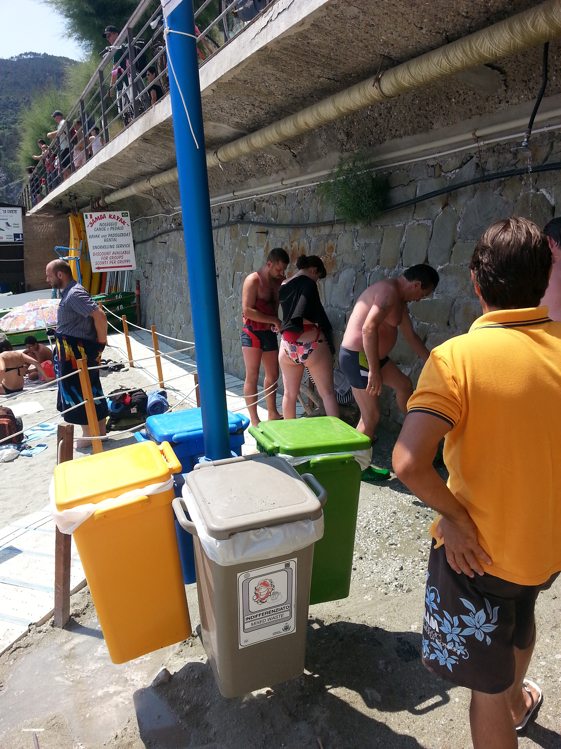 Beach goers rinse off after a pleasant Monterosso afternoon.