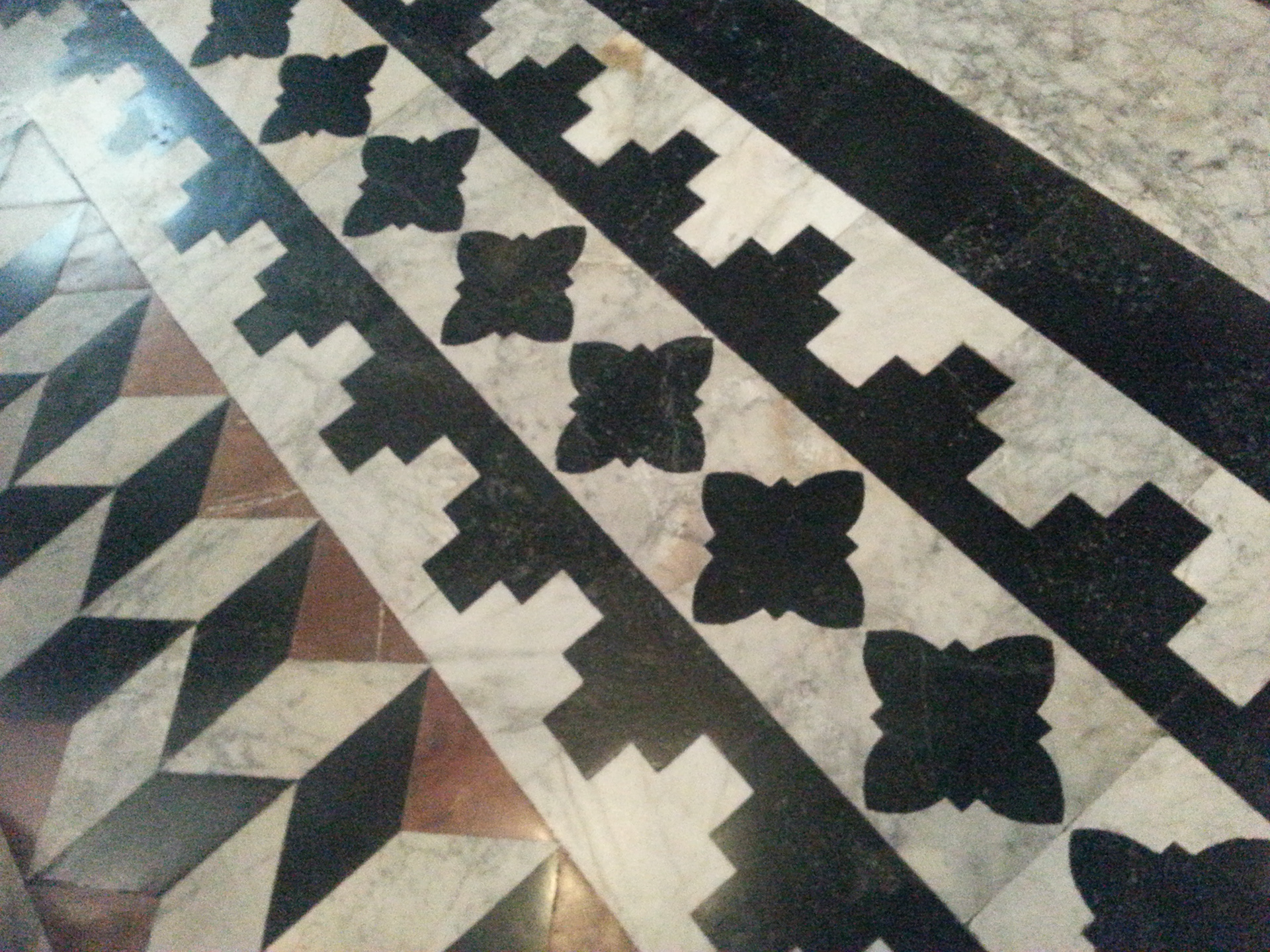    Details of the marble floor of the Duomo, Siena cathedral in Siena, Italy. 