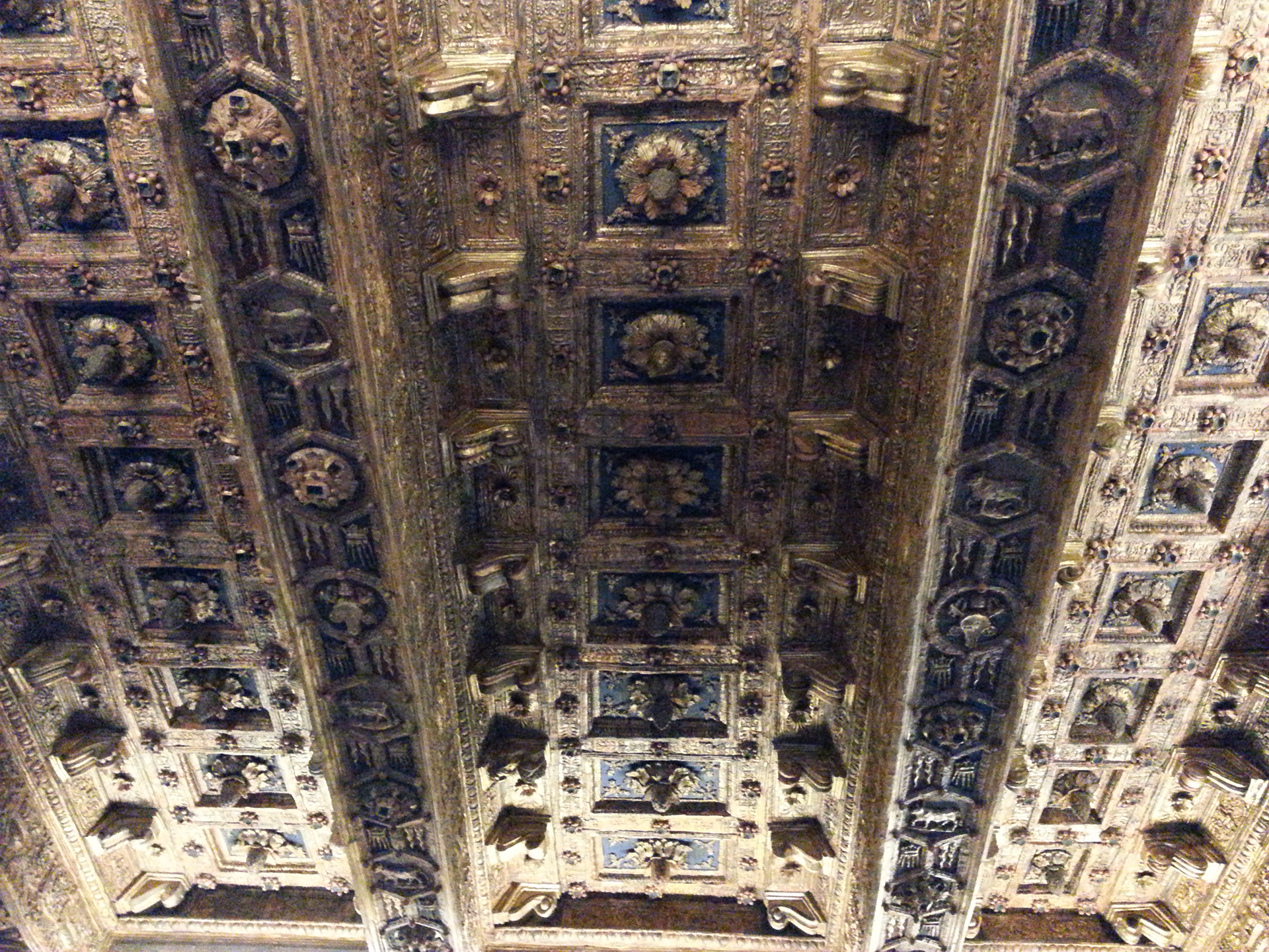 Carved wooden ceiling of Pope Alexander VI Borgia's private bedroom (Borgia Seal over fireplace hacked off) - Borgia Apartments, Vatican, Rome 