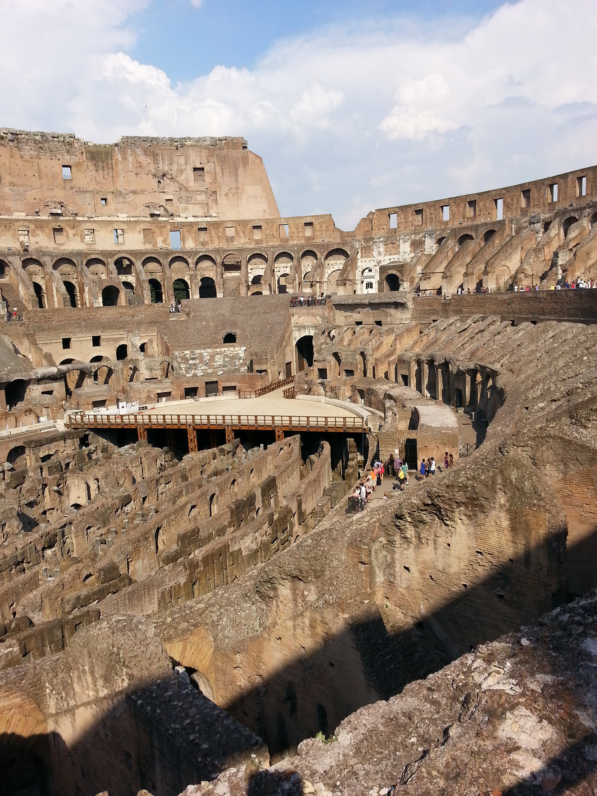 The ground level of the Colosseum is only partially constructed at one end of the amphitheater. Below that level are the chambers where they kept the gladiators and various beasts before the slaughter began. 